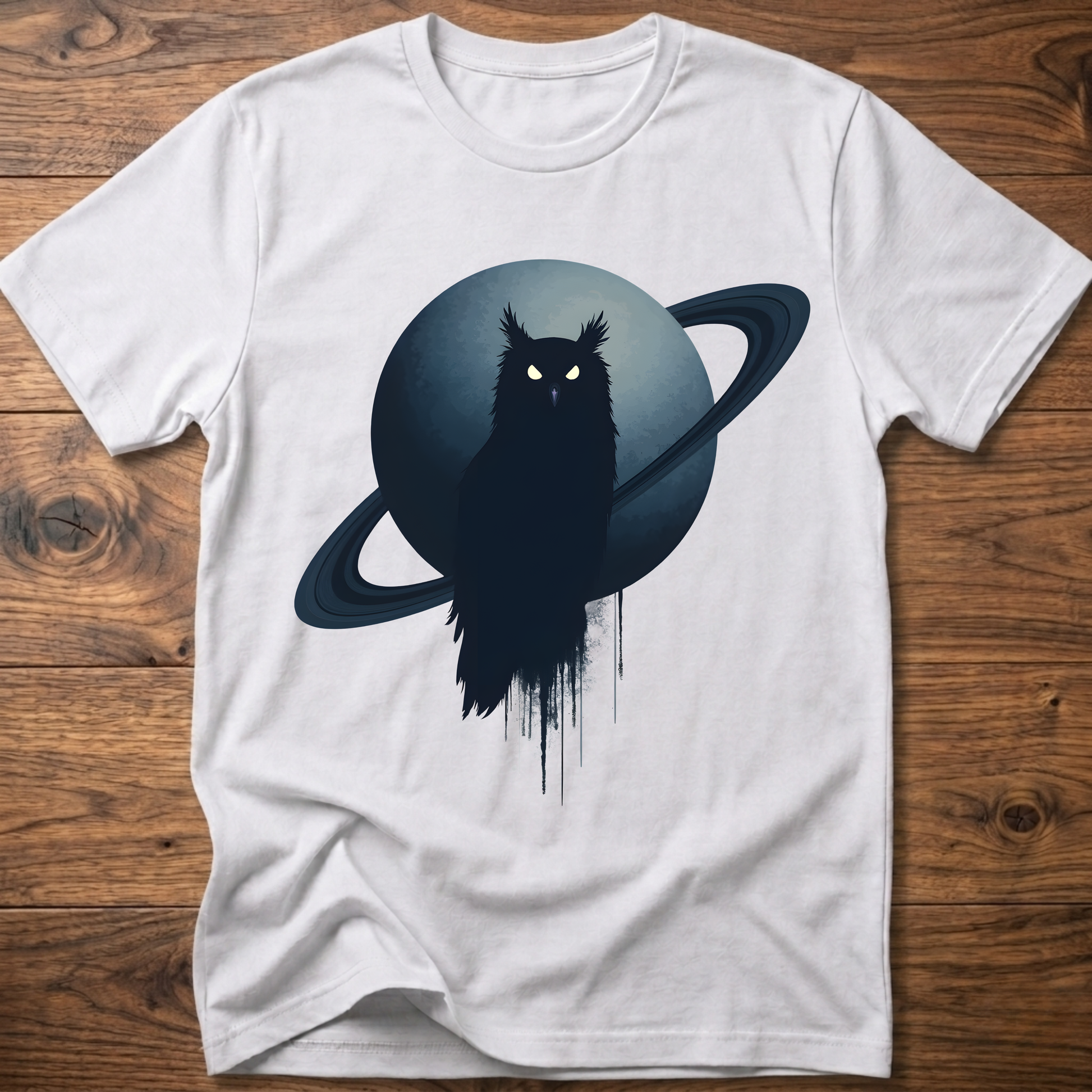 White t-shirt with black owl and Saturn graphic print on the front