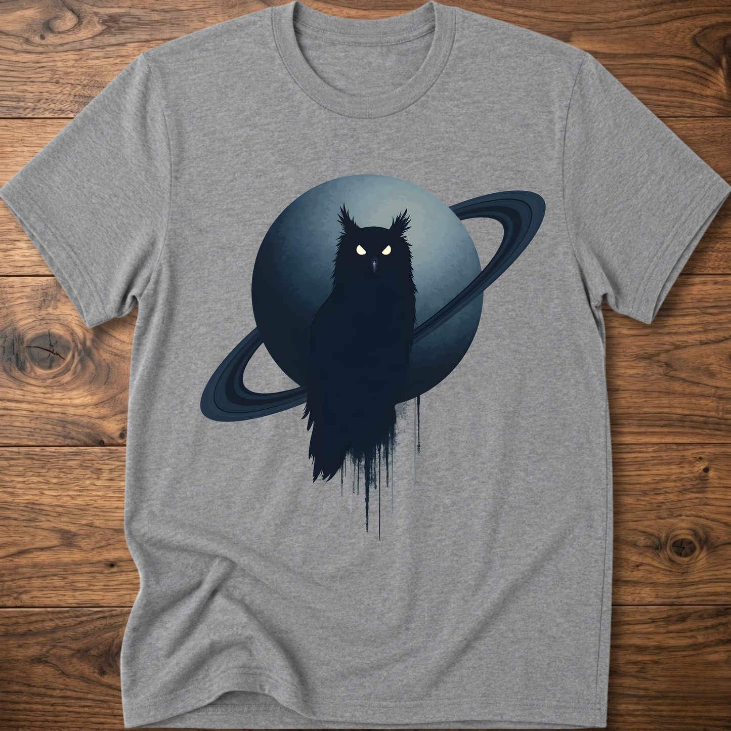 Gray t-shirt with black owl and Saturn graphic print on the front