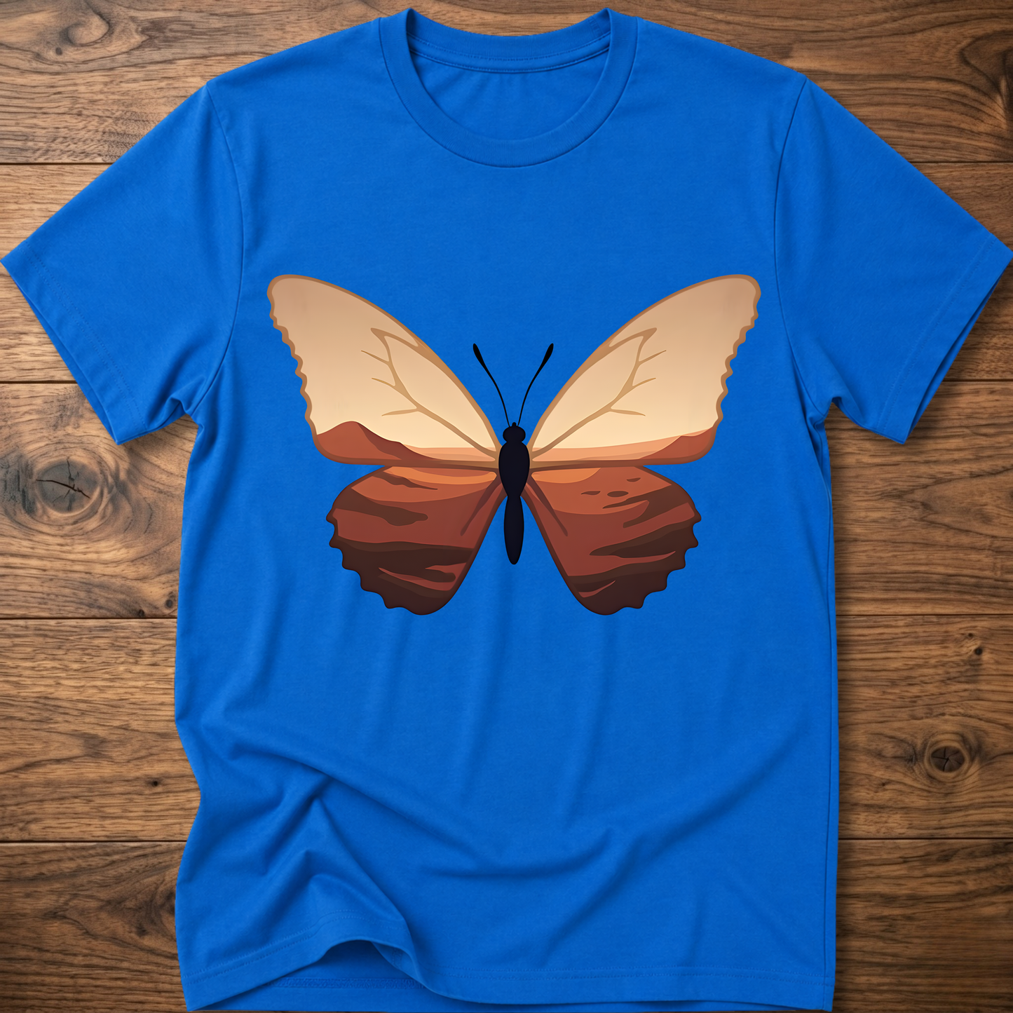 Royal blue crewneck t-shirt with minimalist butterfly graphic on the chest
