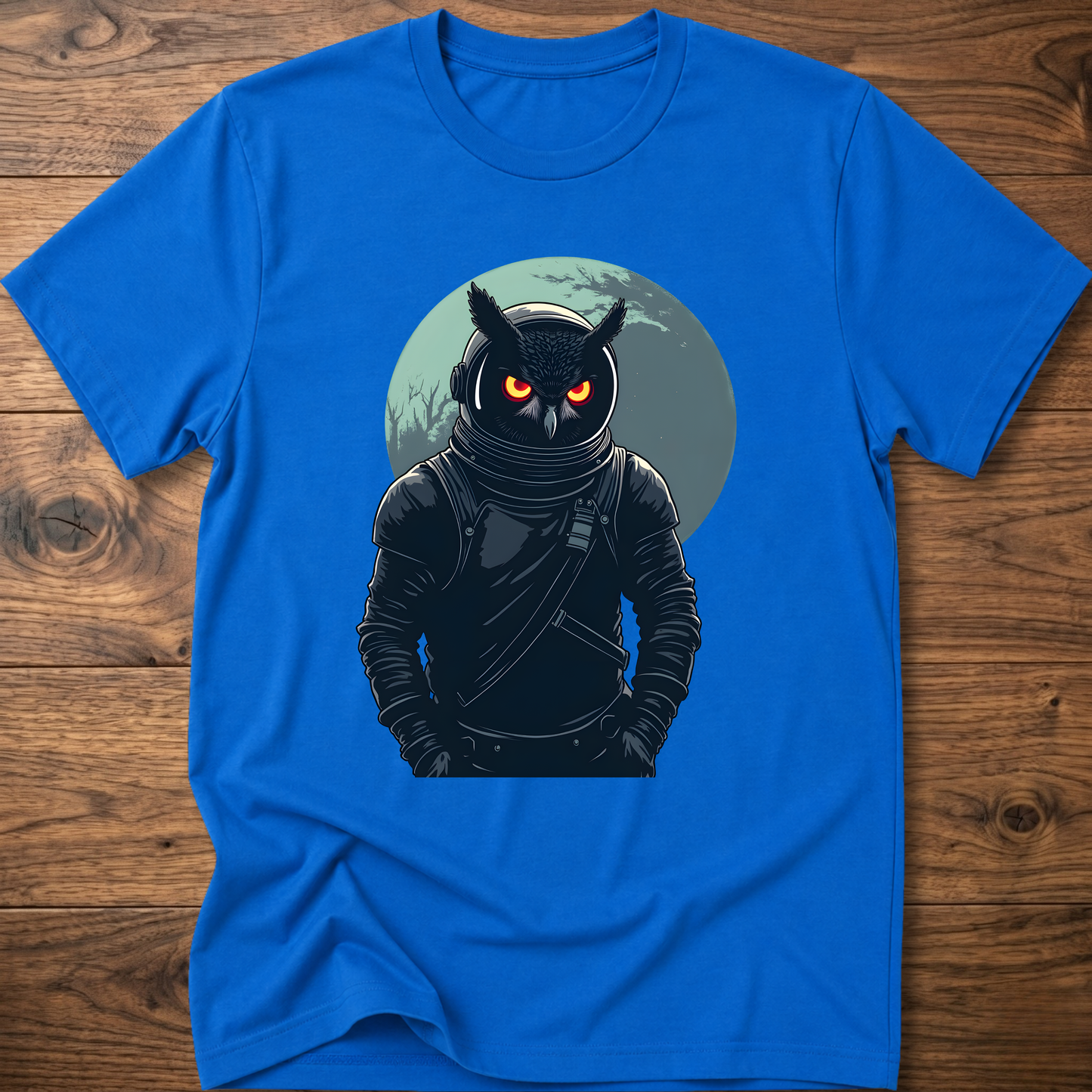 Royal blue crew-neck t-shirt with dark astronaut owl graphic on chest