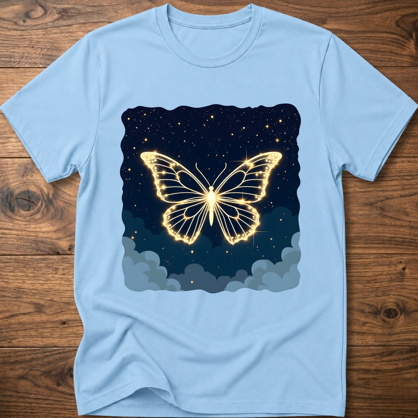 Light blue T-shirt with glowing butterfly graphic over starry night and clouds