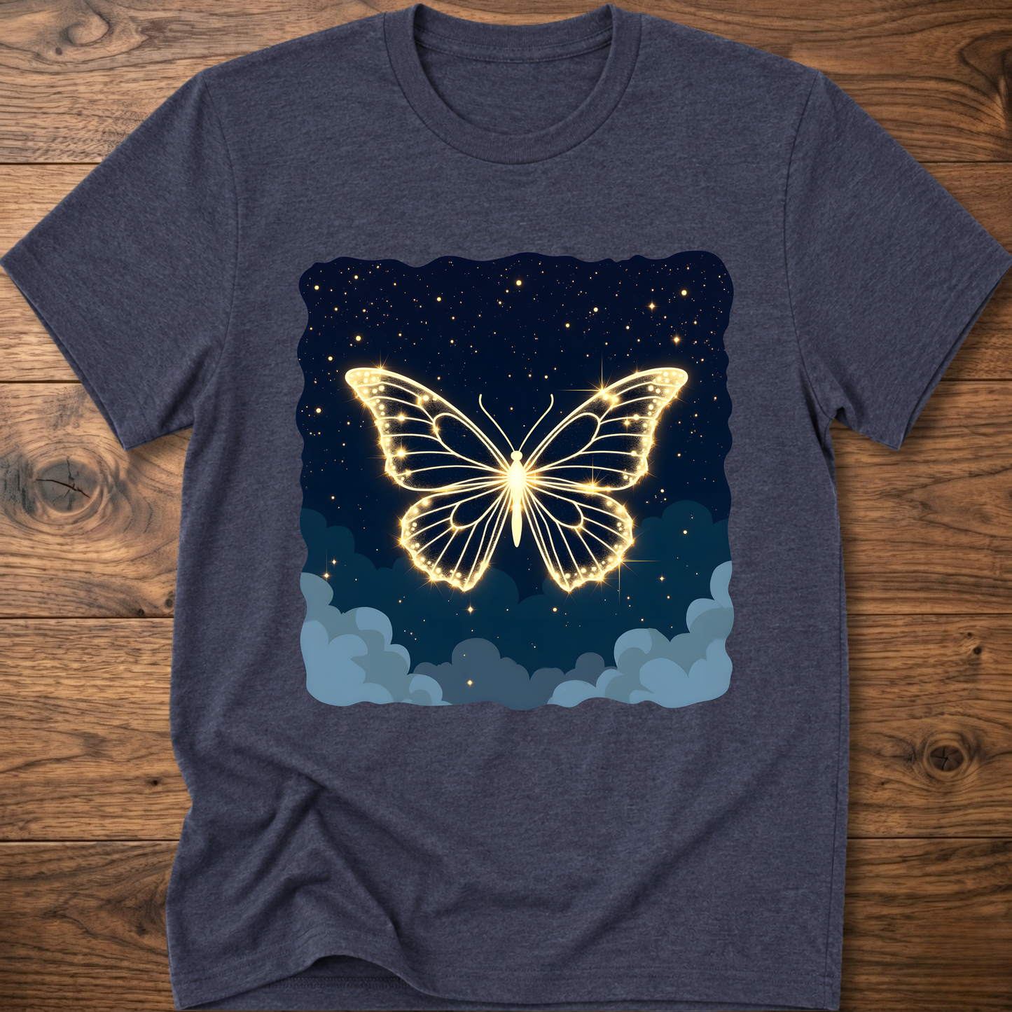 Heather navy T-shirt with glowing butterfly graphic over starry night and clouds