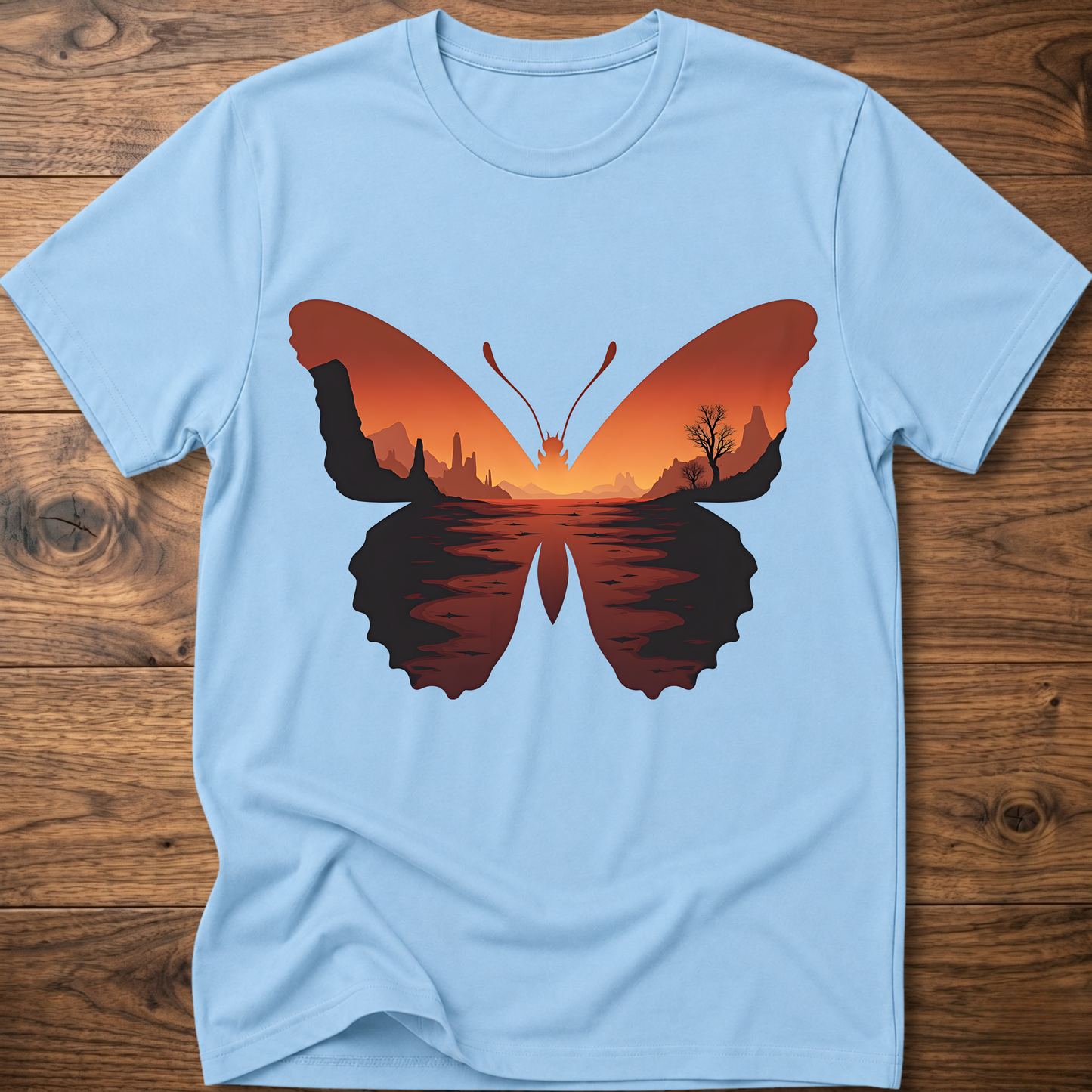 Light blue crew-neck T-shirt with desert butterfly graphic on the chest