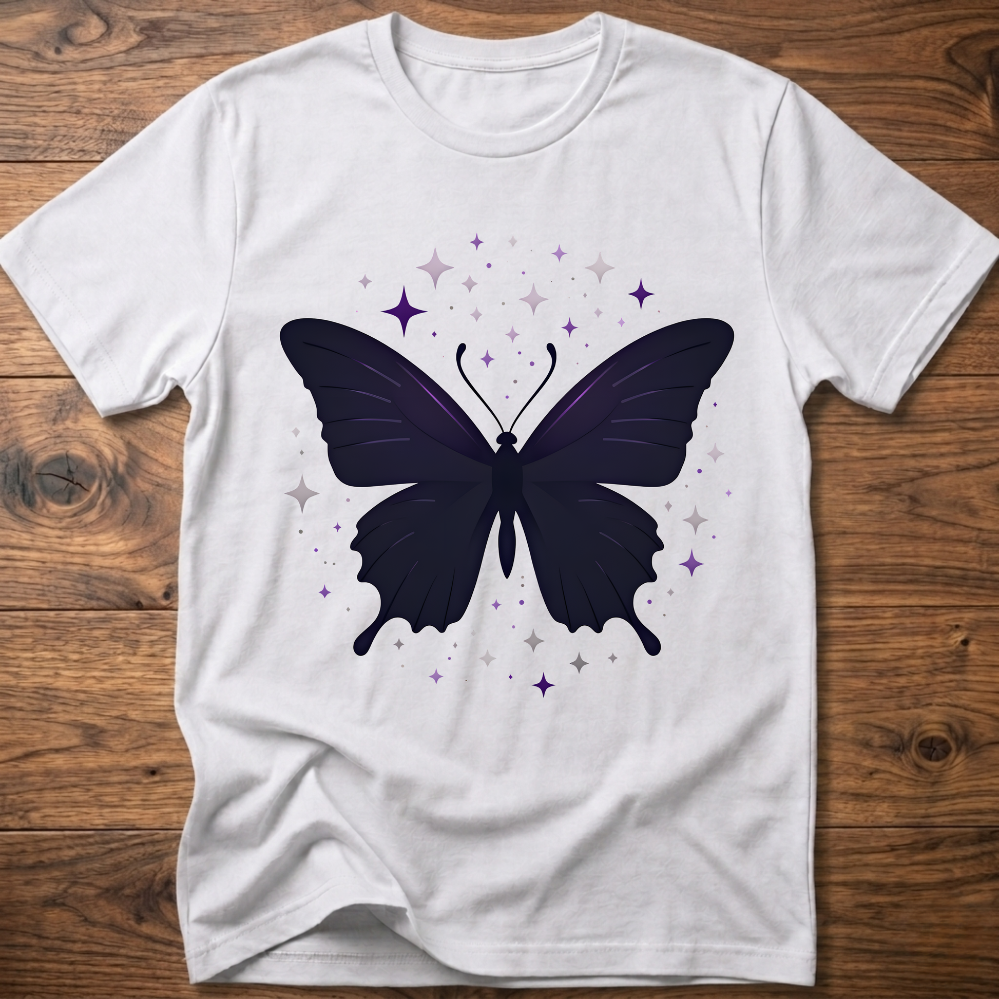 White T-shirt with dark butterfly star graphic in purple and gray