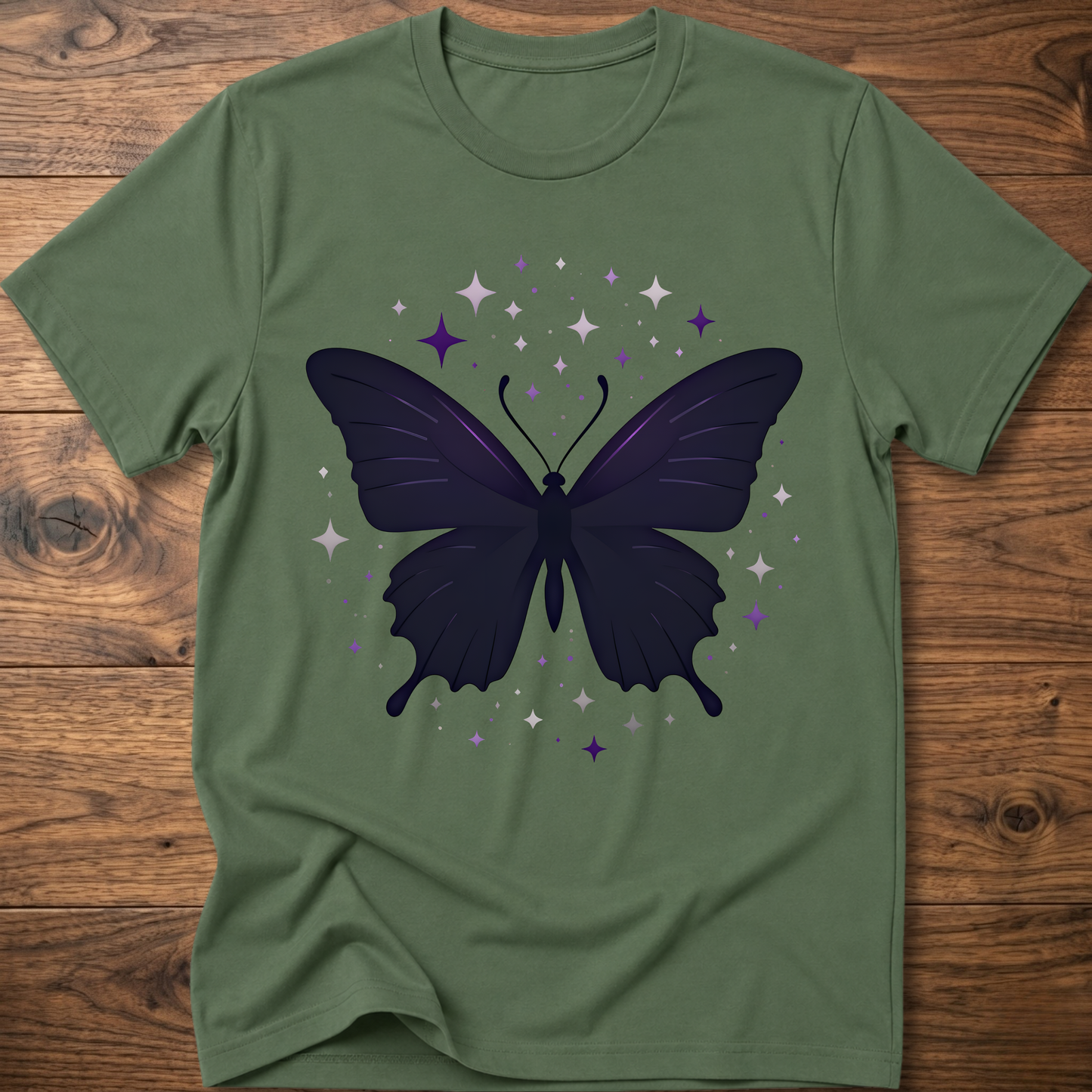 Olive green T-shirt with dark butterfly star graphic in purple and gray