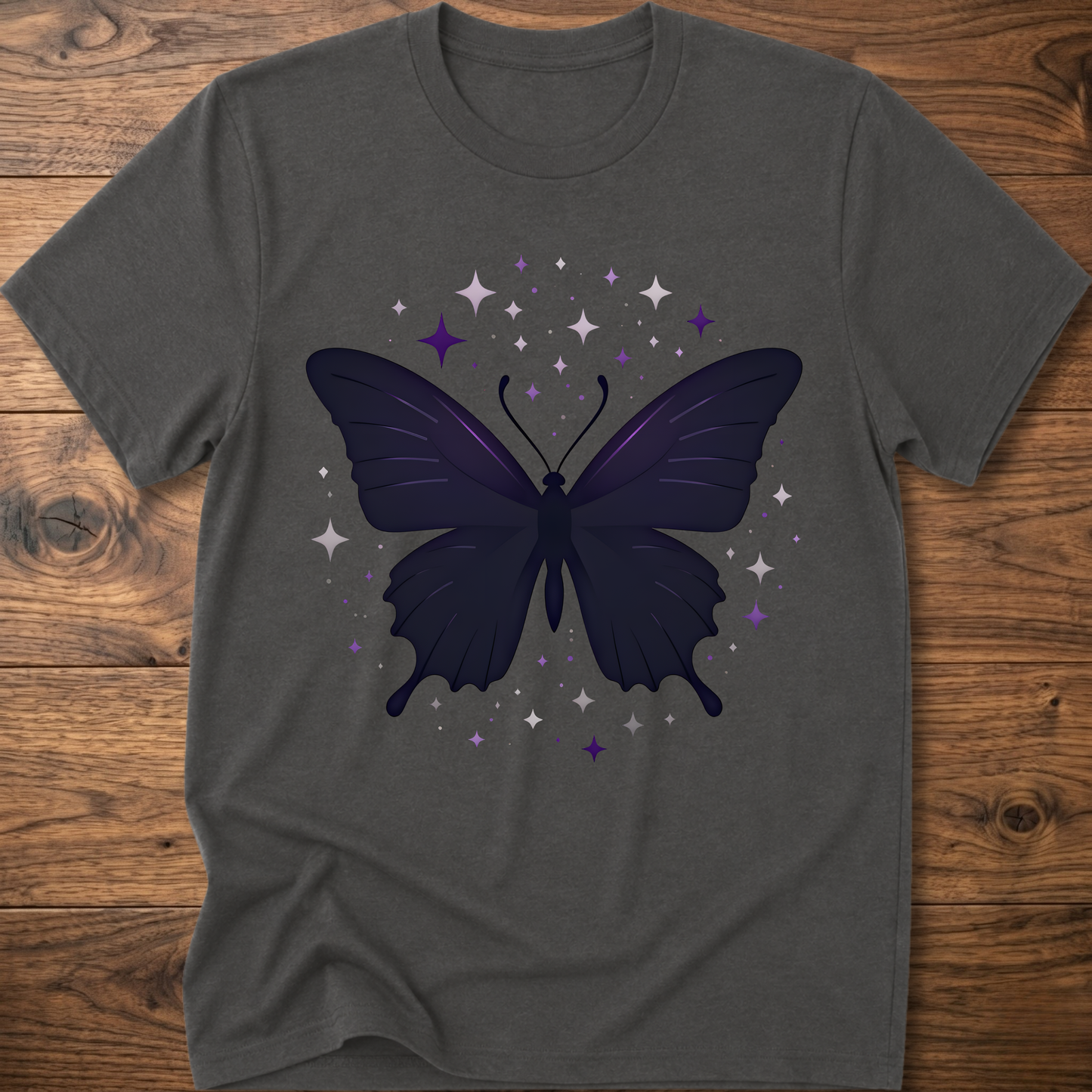 Dark gray T-shirt with dark butterfly star graphic in purple and gray