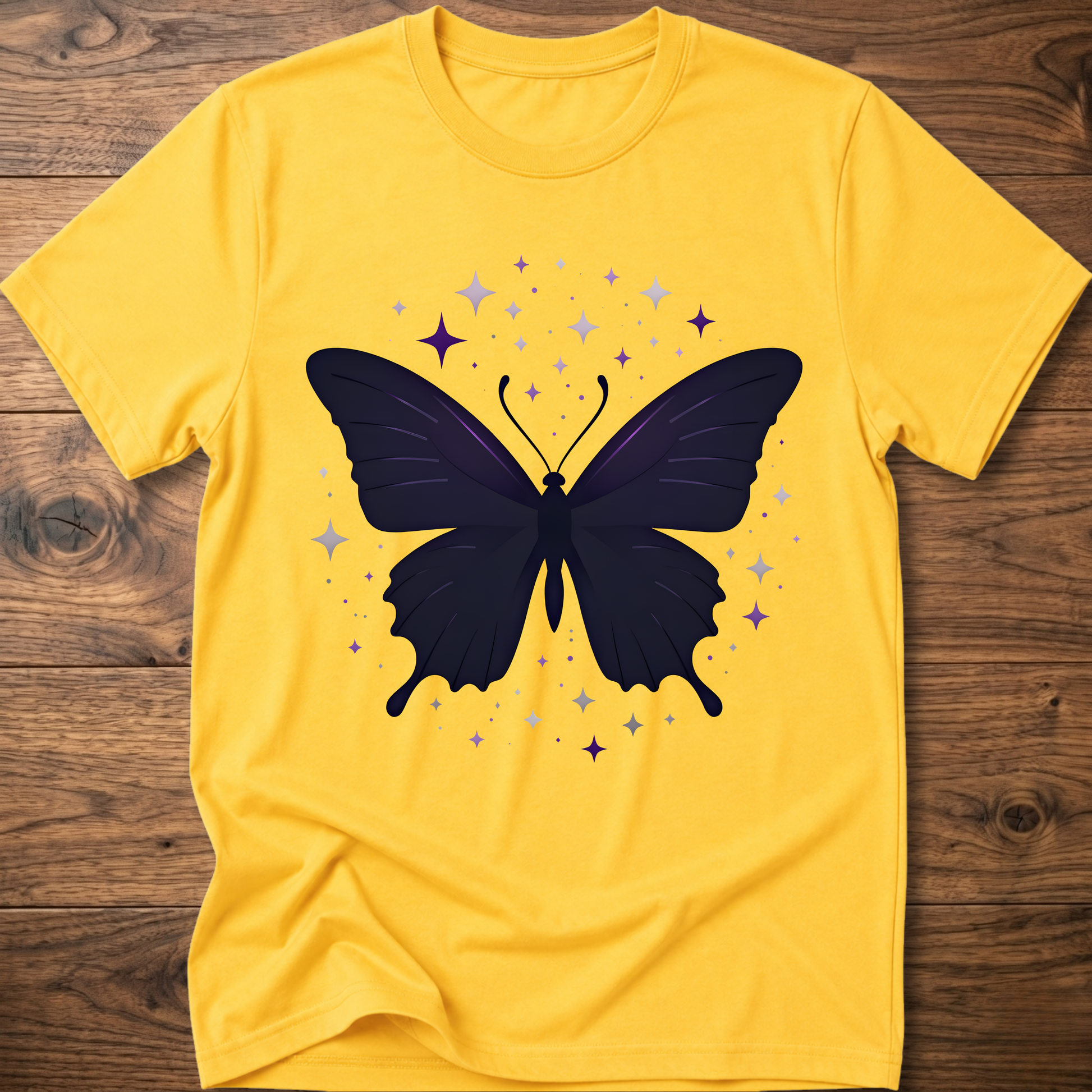 Yellow T-shirt with dark butterfly star graphic in purple and gray