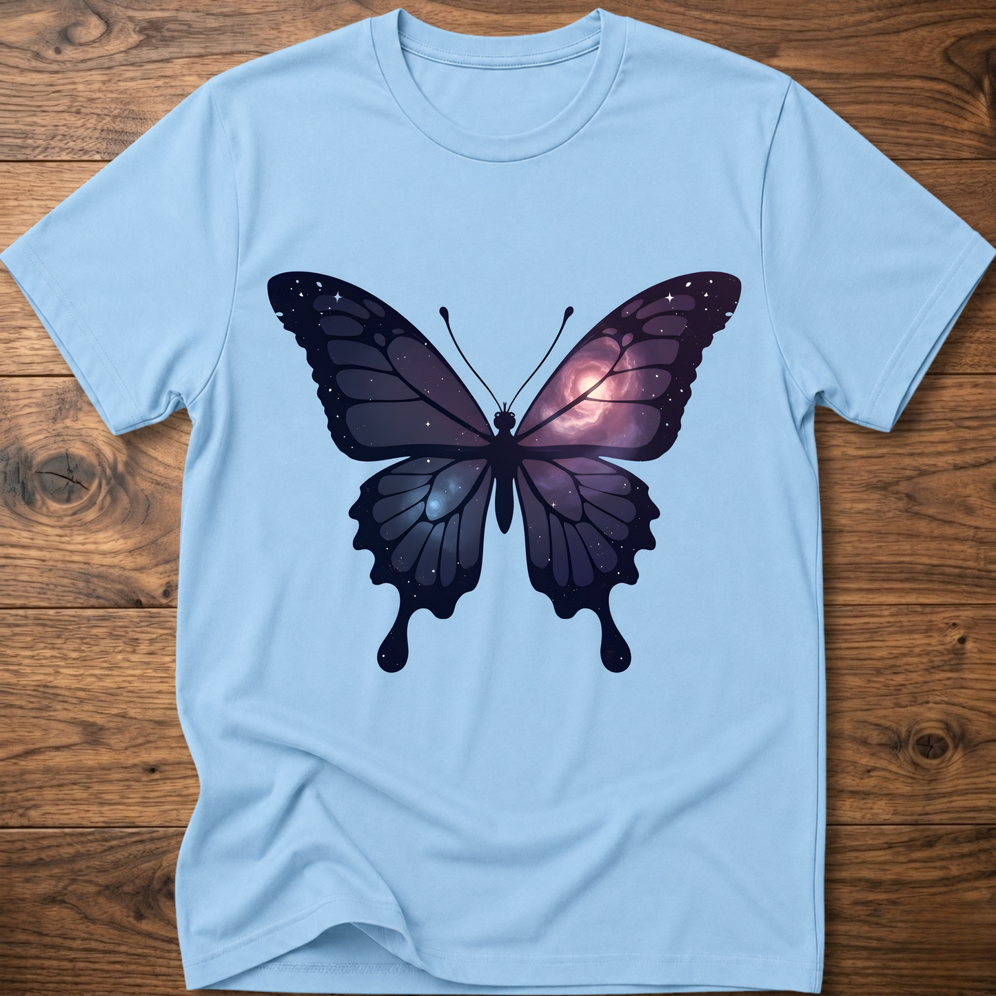 Light blue crew-neck short-sleeve T-shirt with galaxy butterfly graphic in dark blue and purple