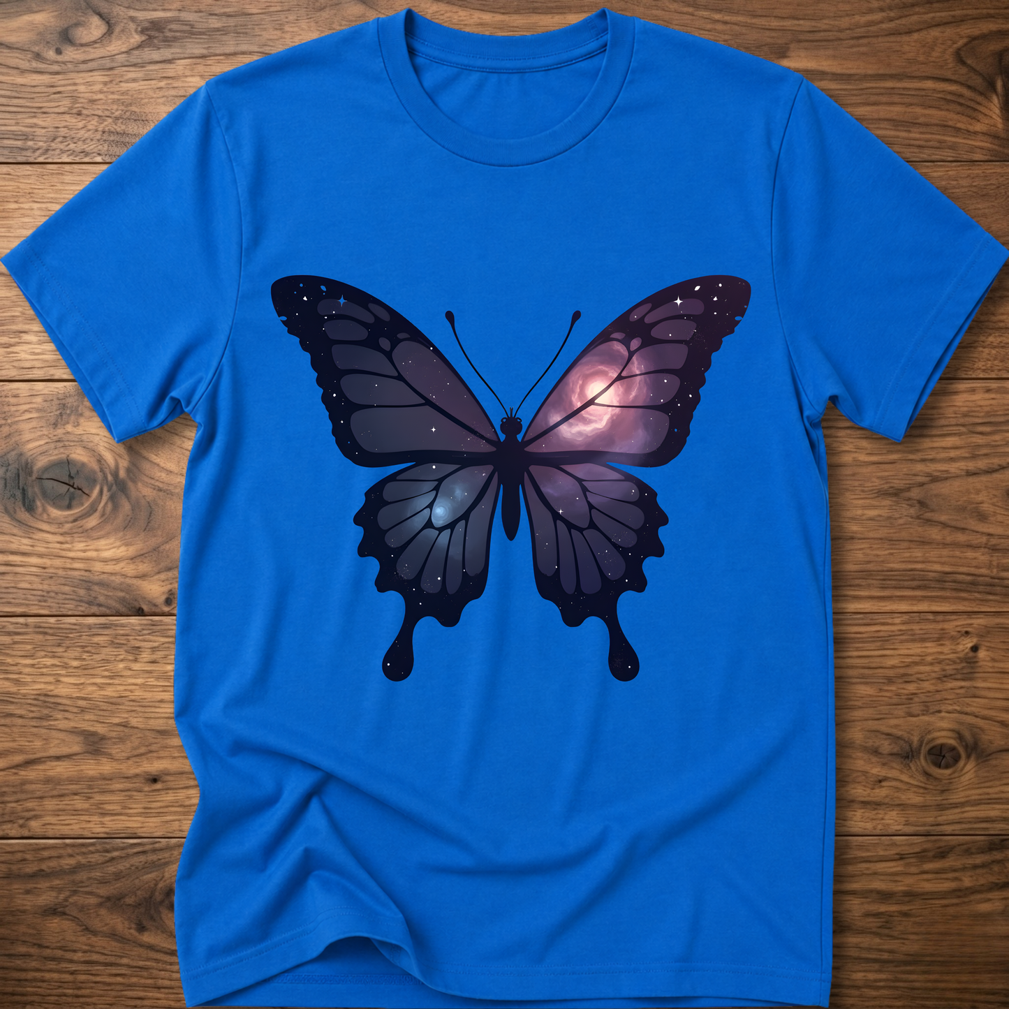 Royal blue crew-neck short-sleeve T-shirt with galaxy butterfly graphic in dark blue and purple