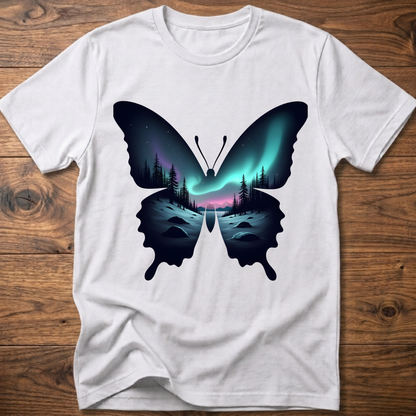 White T-shirt with dark butterfly graphic and glowing forest aurora print