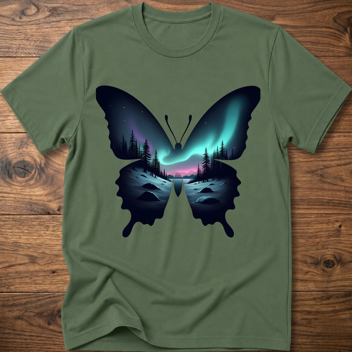 Green T-shirt with dark butterfly graphic and glowing forest aurora print
