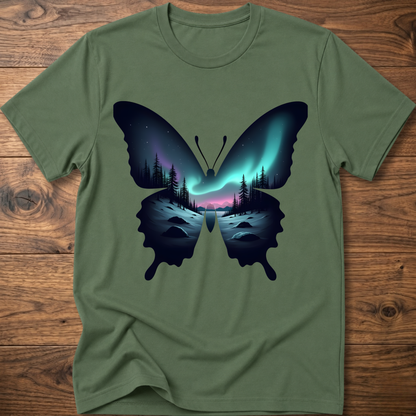 Green T-shirt with dark butterfly graphic and glowing forest aurora print