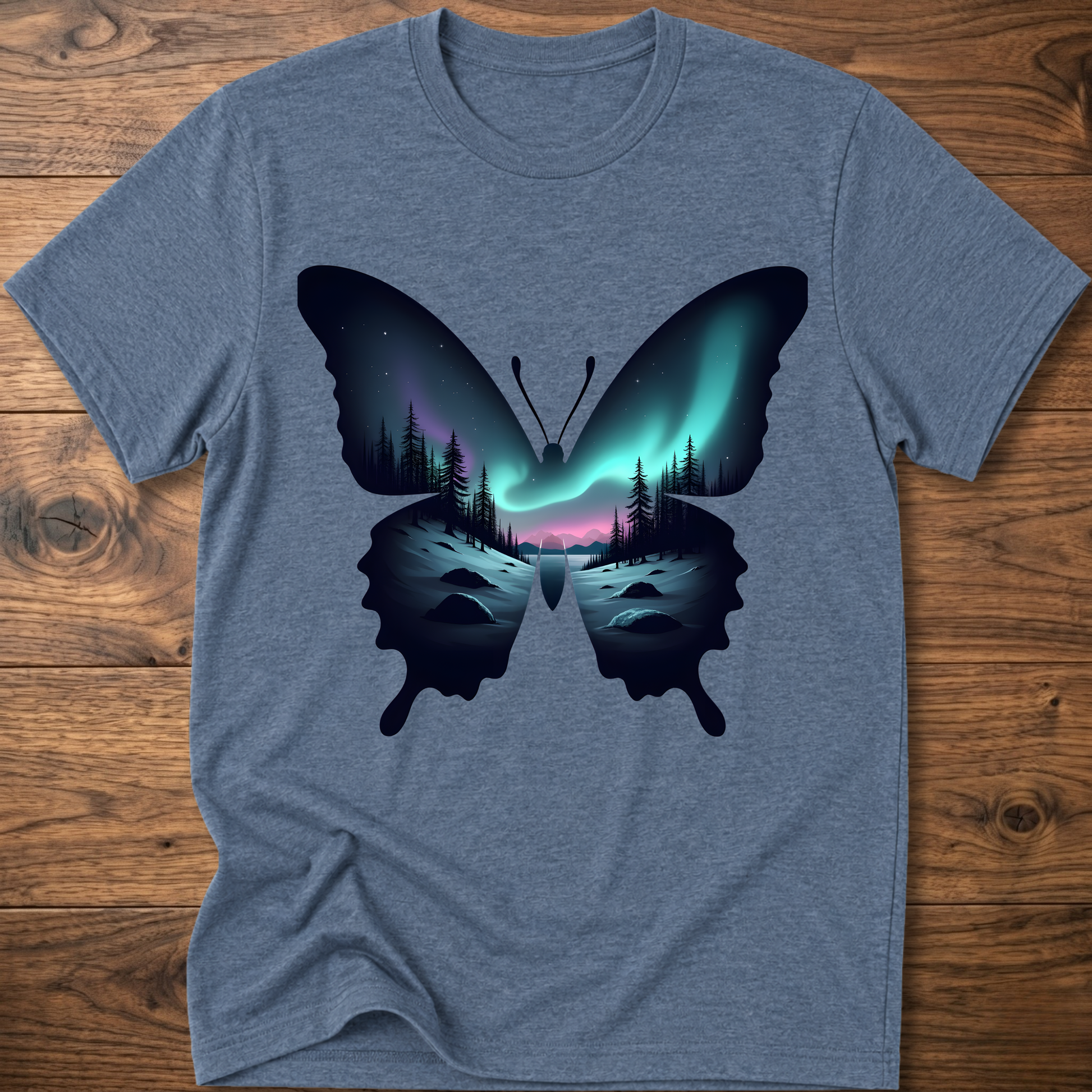 Light blue T-shirt with dark butterfly graphic and glowing forest aurora print