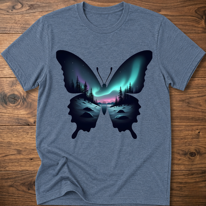 Light blue T-shirt with dark butterfly graphic and glowing forest aurora print