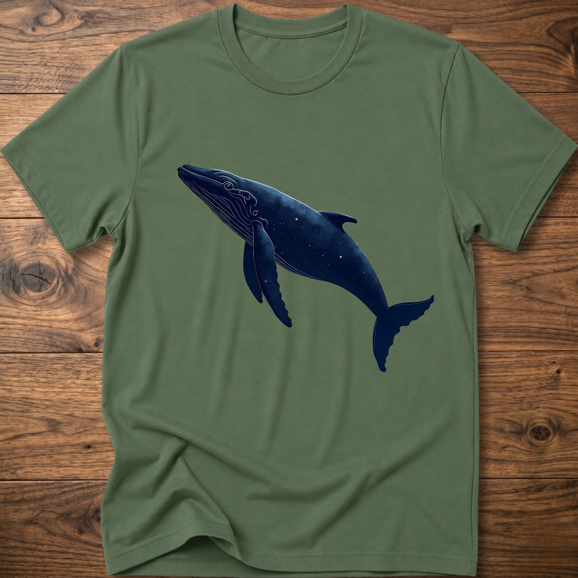 Olive green whale graphic T-shirt with dark blue printed whale on the chest