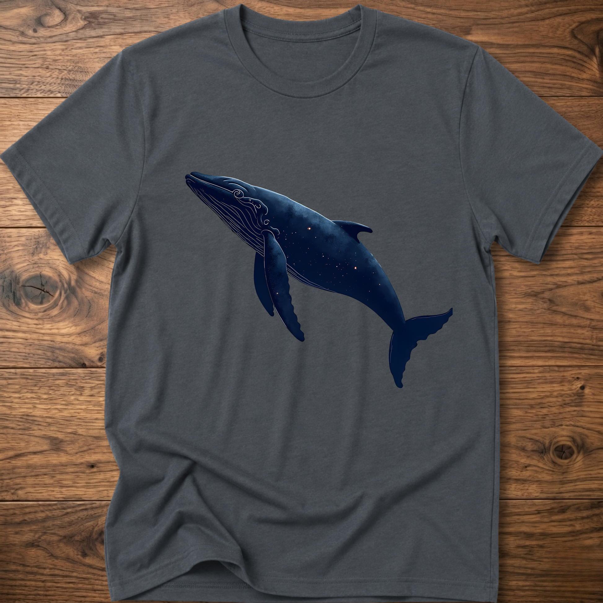 Dark gray crewneck T-shirt with blue whale graphic on front
