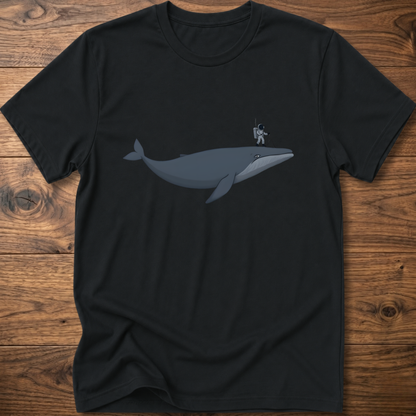 Black astronaut whale T-shirt with graphic whale and astronaut standing on back fin