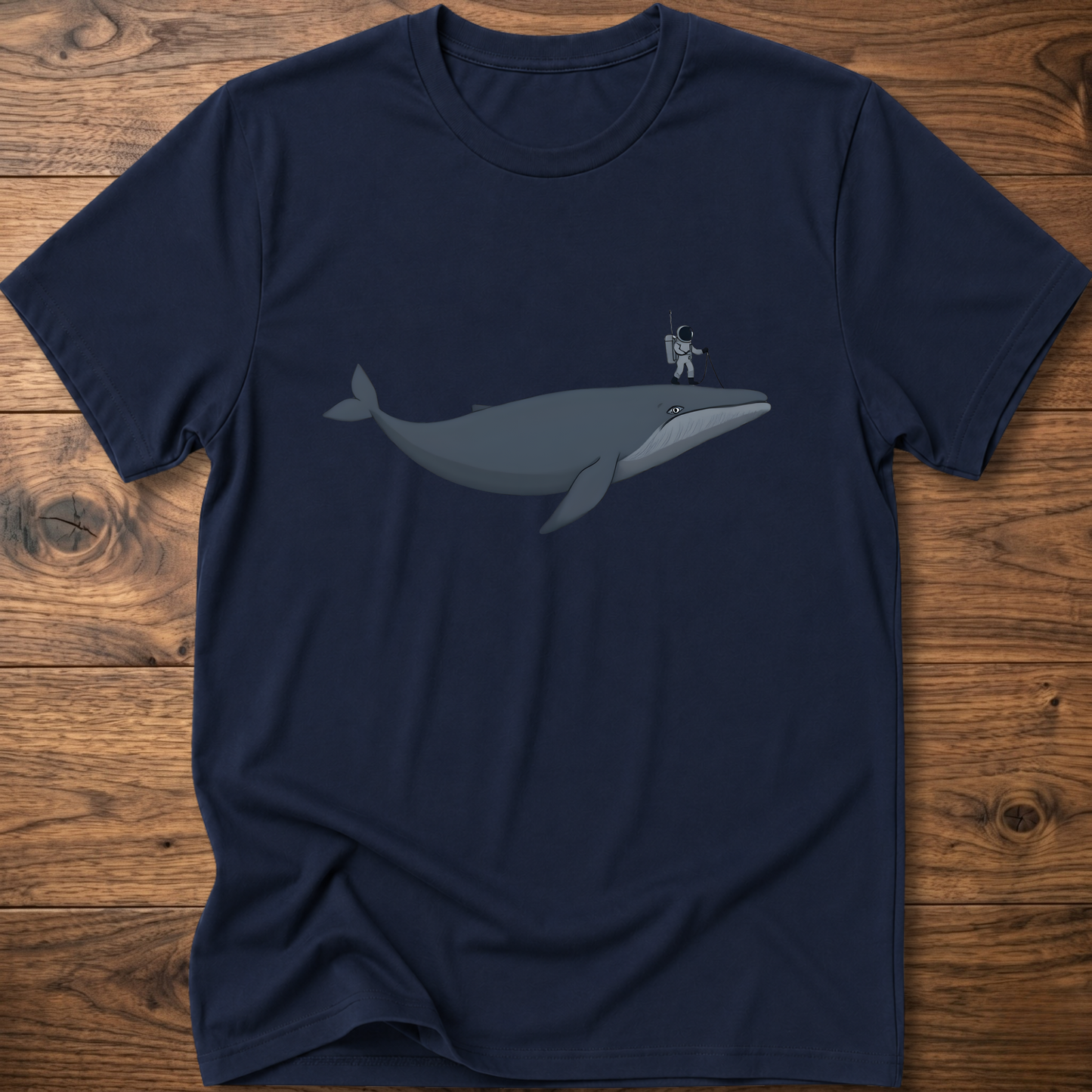 Navy short-sleeve crewneck T-shirt with minimalist whale and astronaut graphic