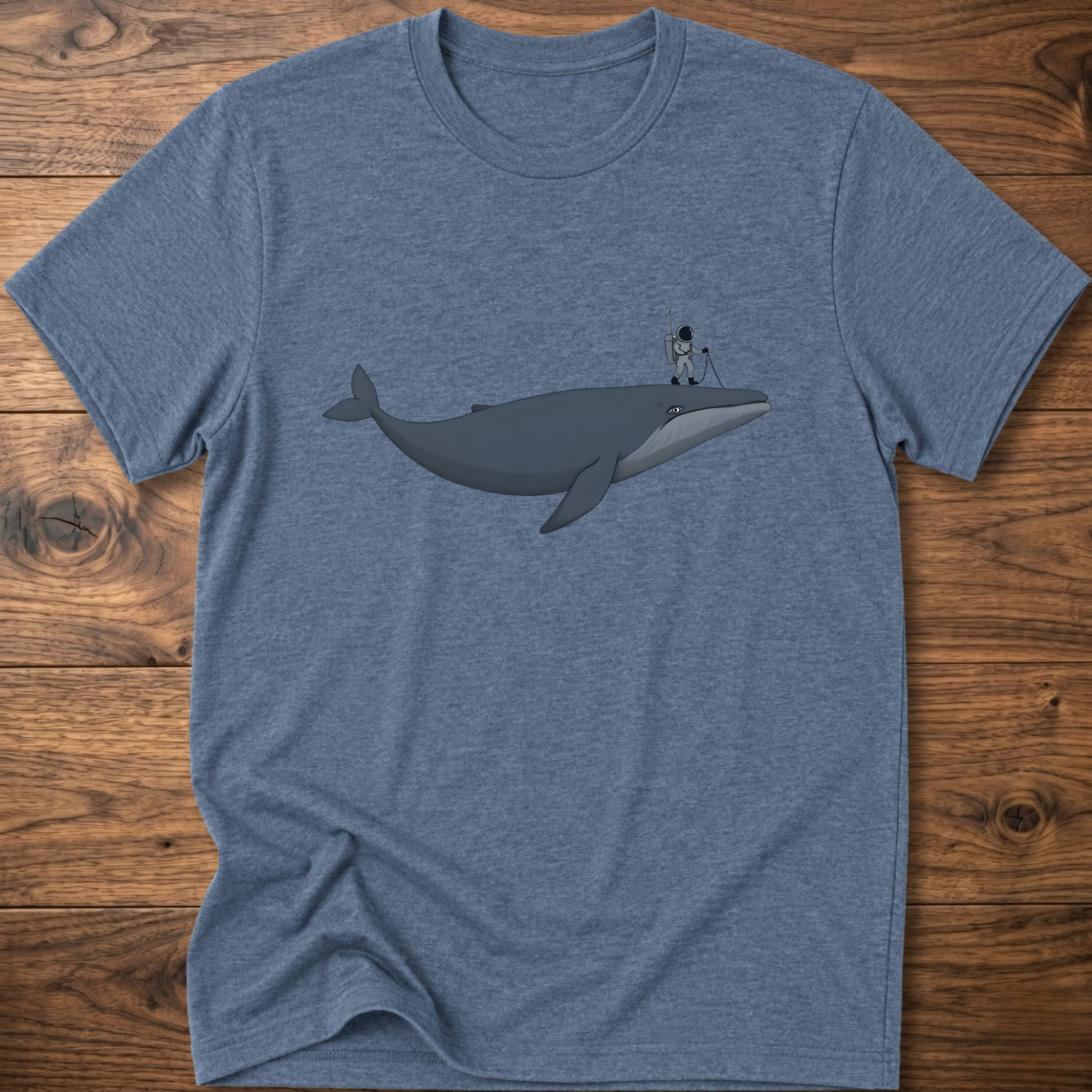 Gray astronaut whale T-shirt with graphic whale and astronaut standing on back fin
