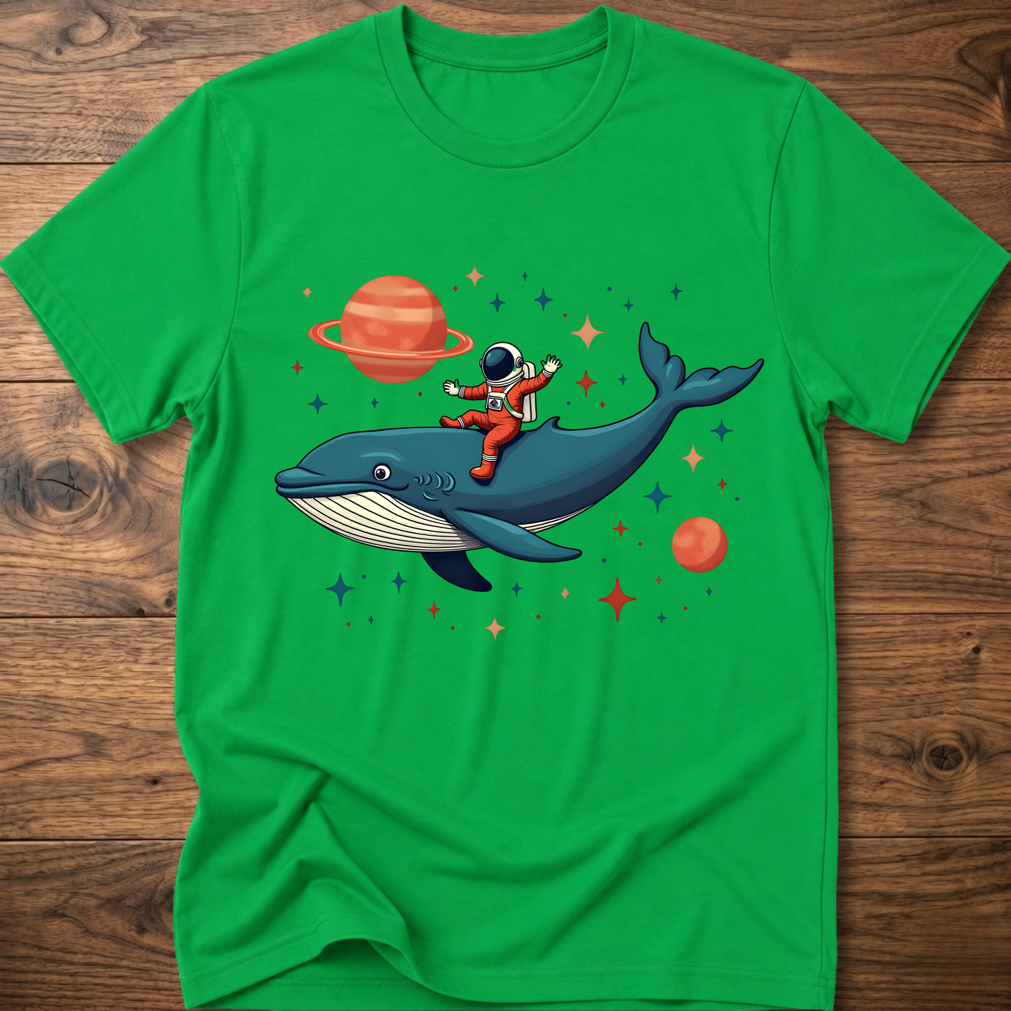 Green astronaut and whale space-themed t-shirt with colorful front graphic