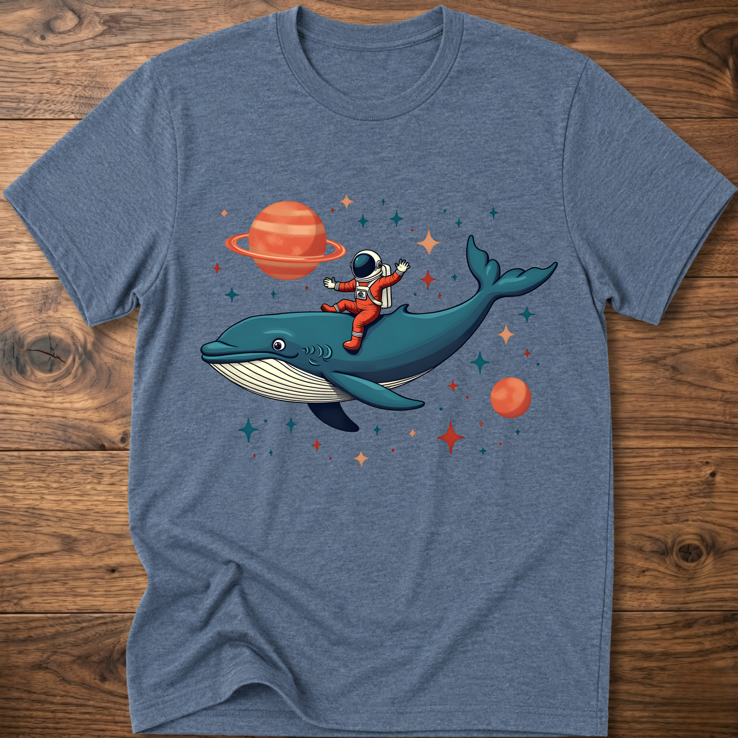 Heather blue astronaut and whale space-themed t-shirt with colorful front graphic