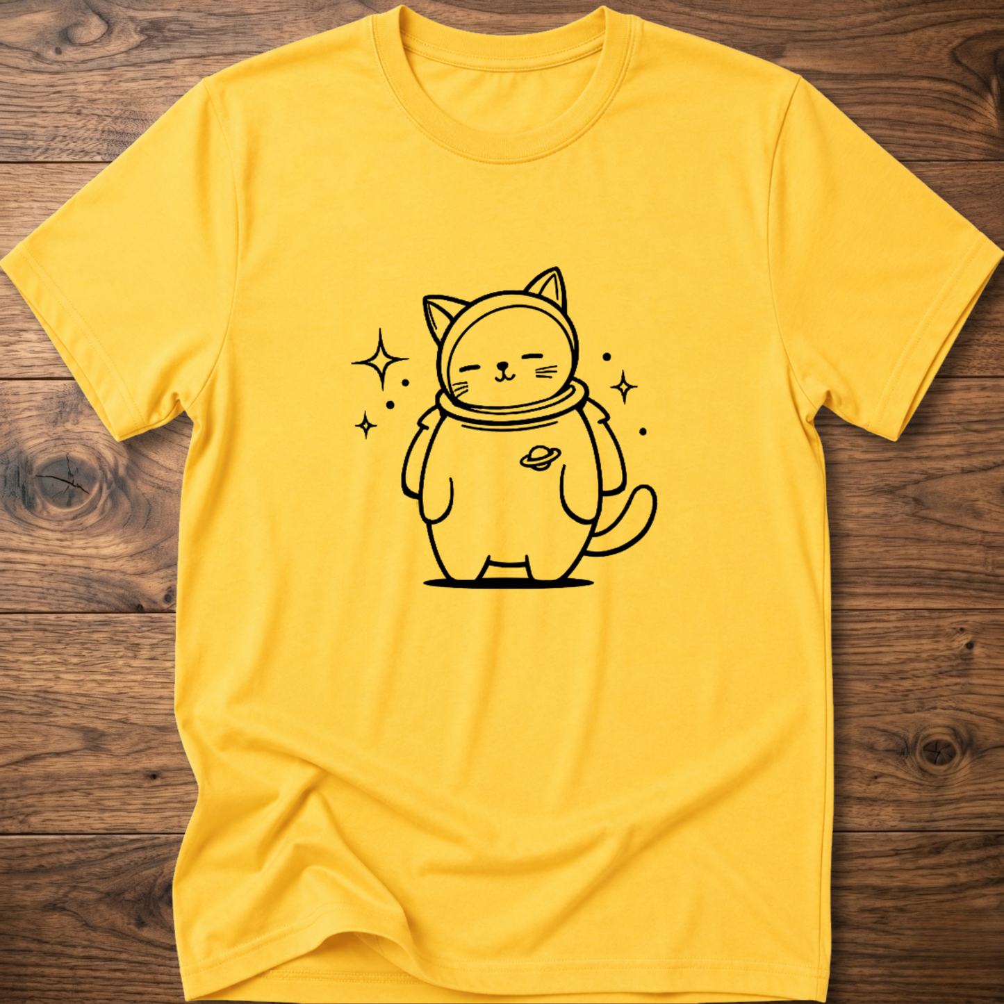 Daisy yellow crew-neck T-shirt with astronaut cat graphic on the front