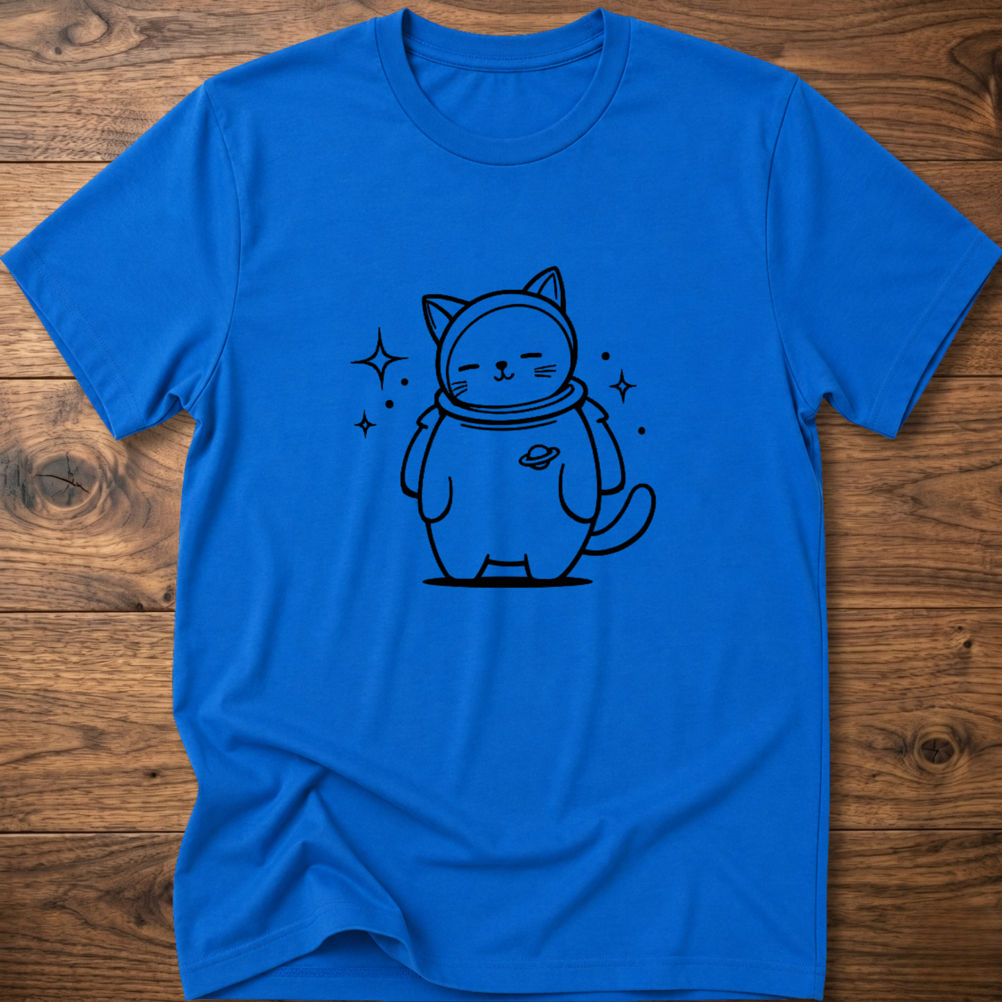 Royal blue crew-neck T-shirt with astronaut cat graphic on the front