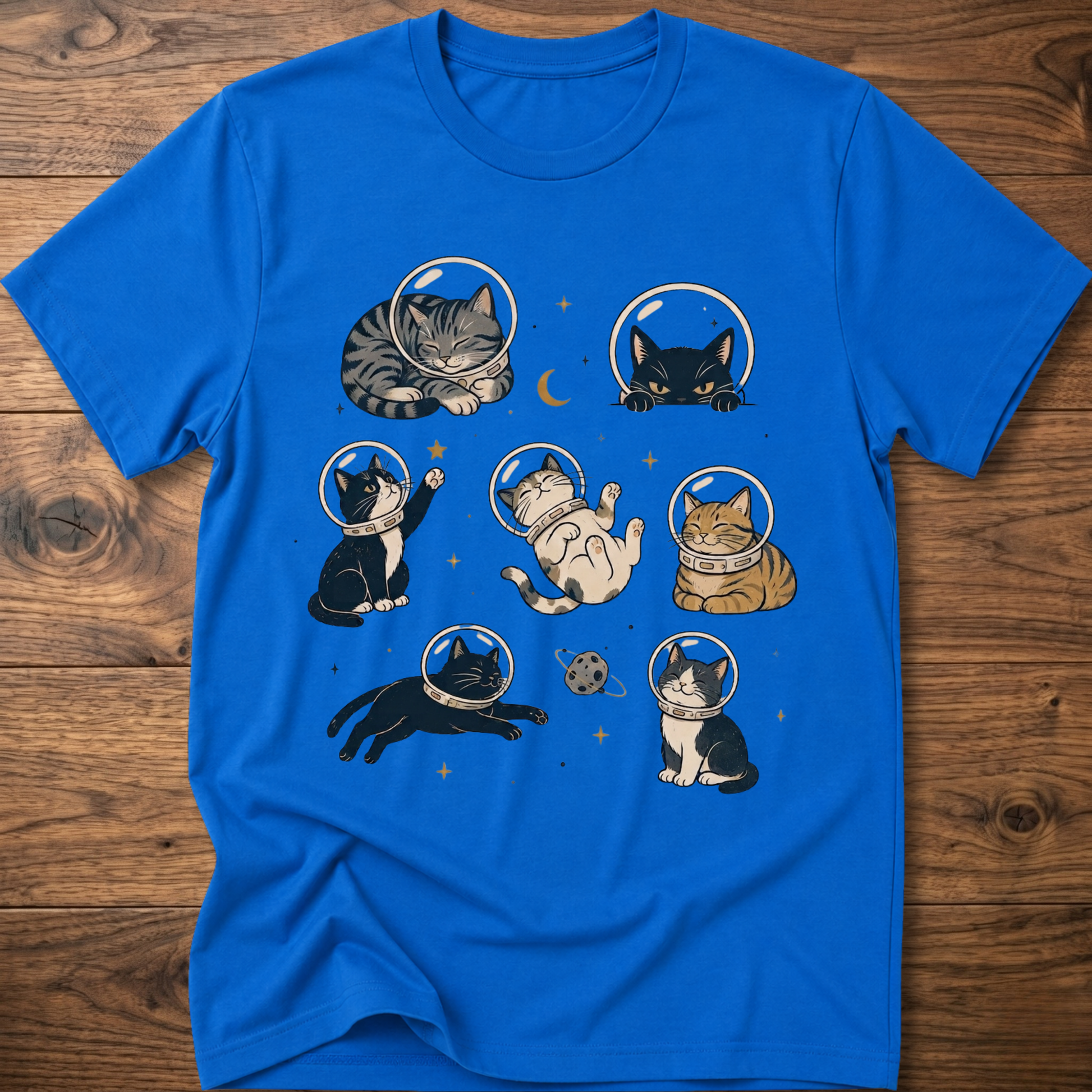Cats-in-space graphic T-shirt in royal blue, crew neck, cat astronaut illustration