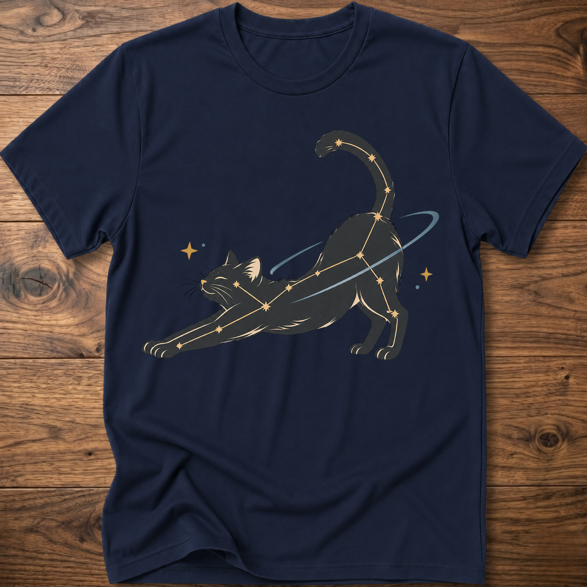 Navy cat constellation T-shirt with illustrated cat and star accents holding a wand