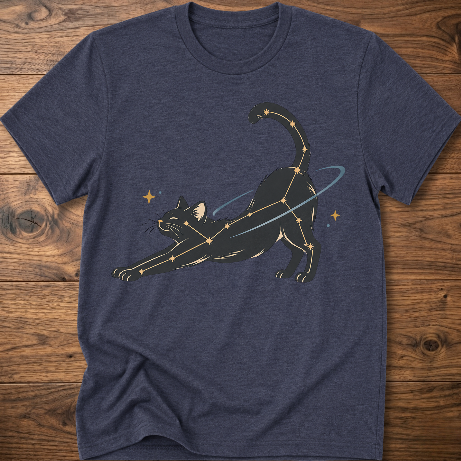 Heather navy cat constellation T-shirt with illustrated cat and star accents holding a wand