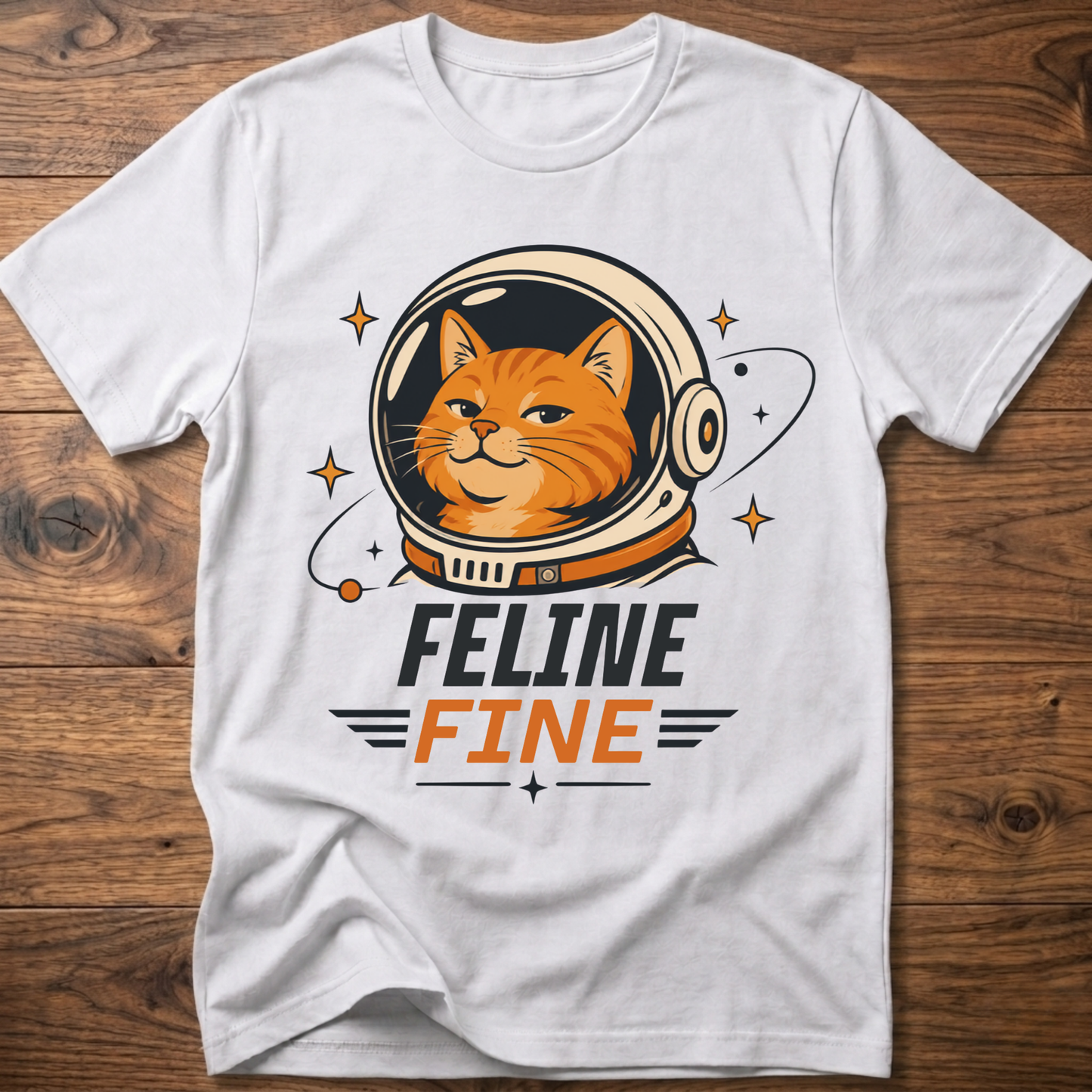 White cat astronaut t-shirt with 'Feline Fine' logo
