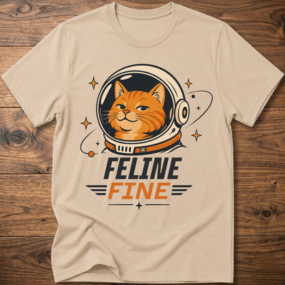 Beige cat astronaut t-shirt with 'Feline Fine' logo