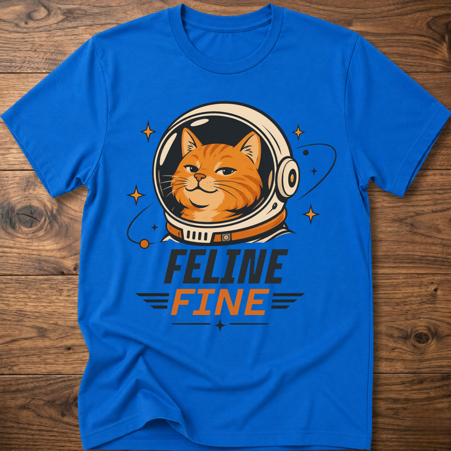 Royal blue cat astronaut t-shirt with 'Feline Fine' logo