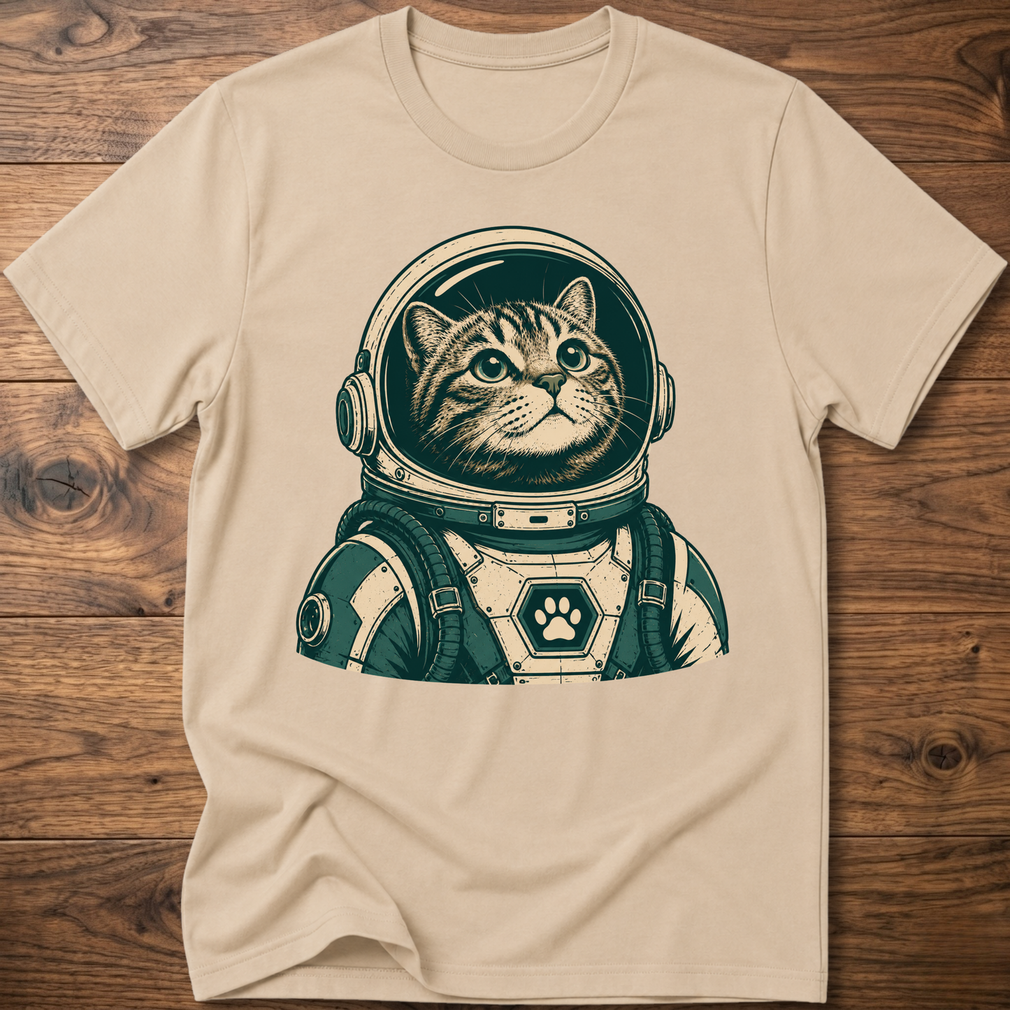 Sand/beige short-sleeve t-shirt with retro astronaut cat graphic on front