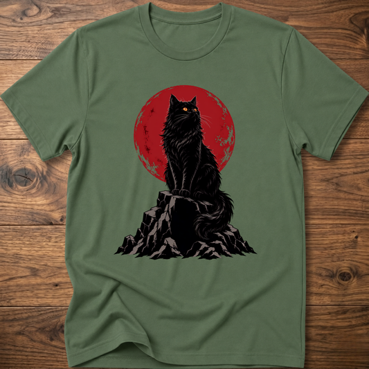 Military green t-shirt with black cat graphic on rocky ground inside red circle.