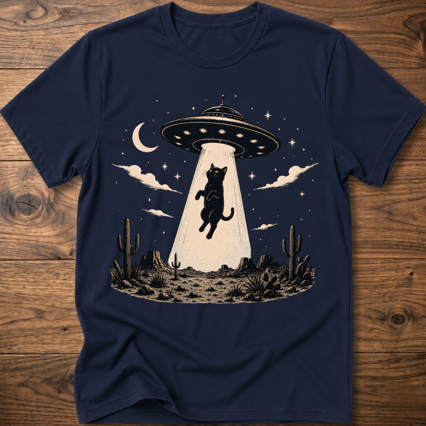 Cat UFO graphic t-shirt in navy, crewneck with black cat under UFO scene with moon