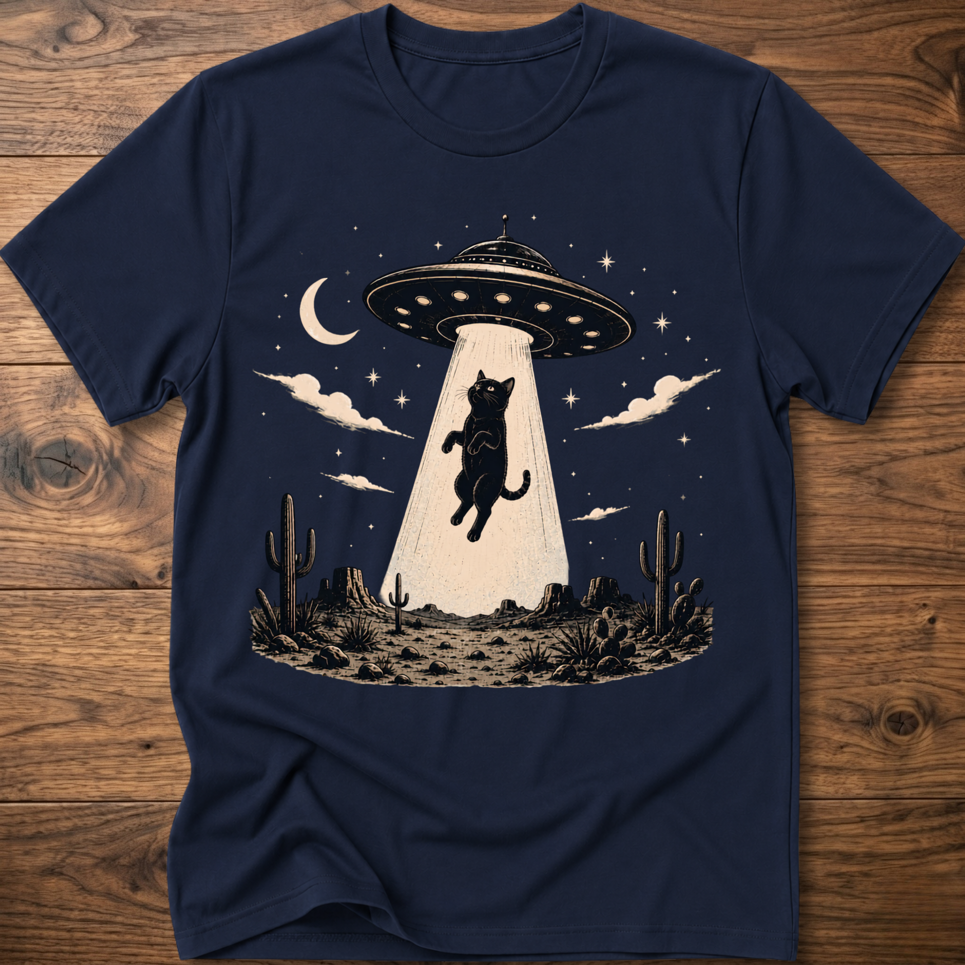 Cat UFO graphic t-shirt in navy, crewneck with black cat under UFO scene with moon
