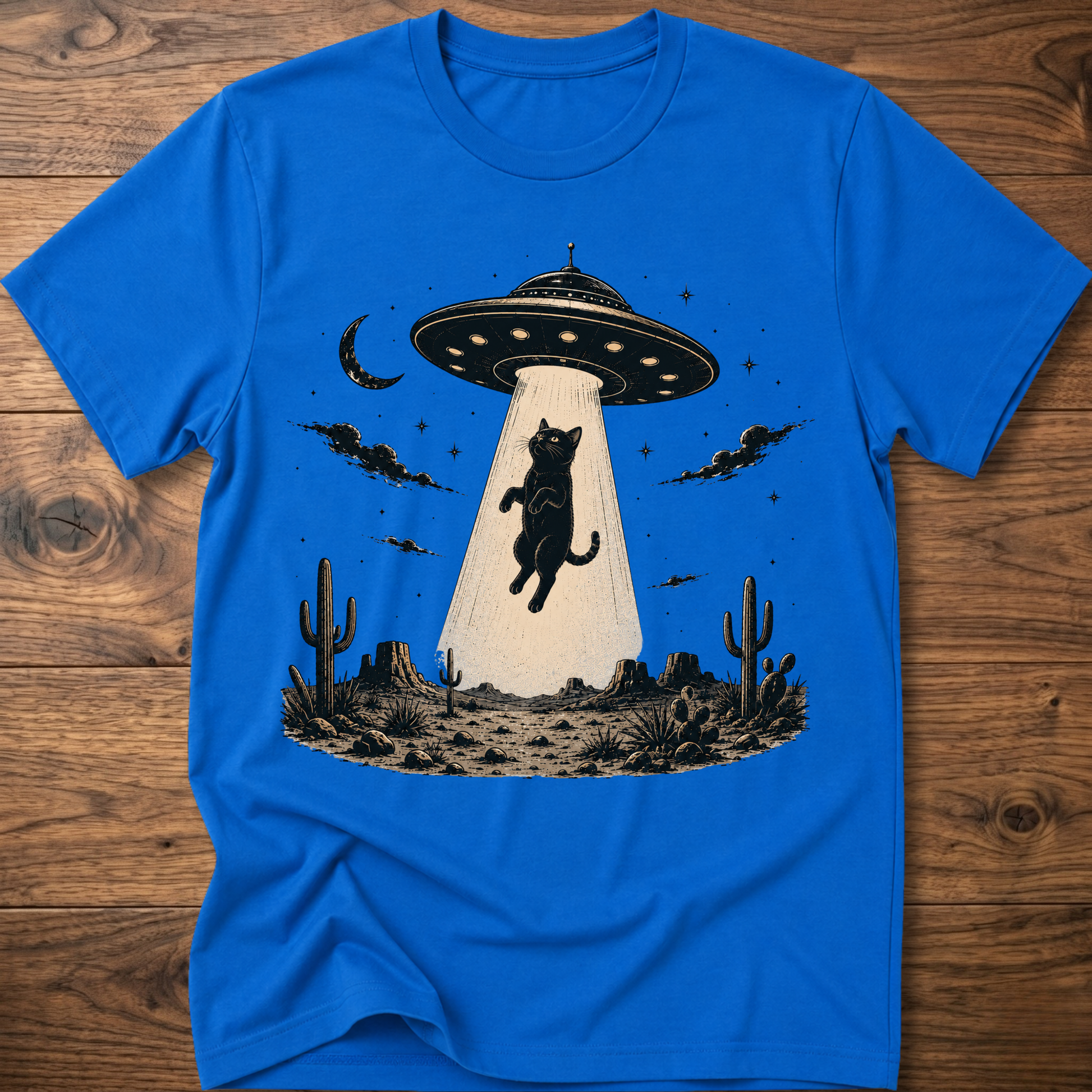 Cat UFO graphic t-shirt in royal blue, crewneck with black cat under UFO scene