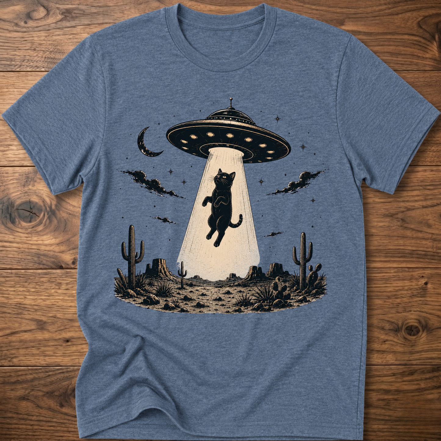 Cat UFO graphic t-shirt in heather indigo, crewneck with black cat under UFO scene