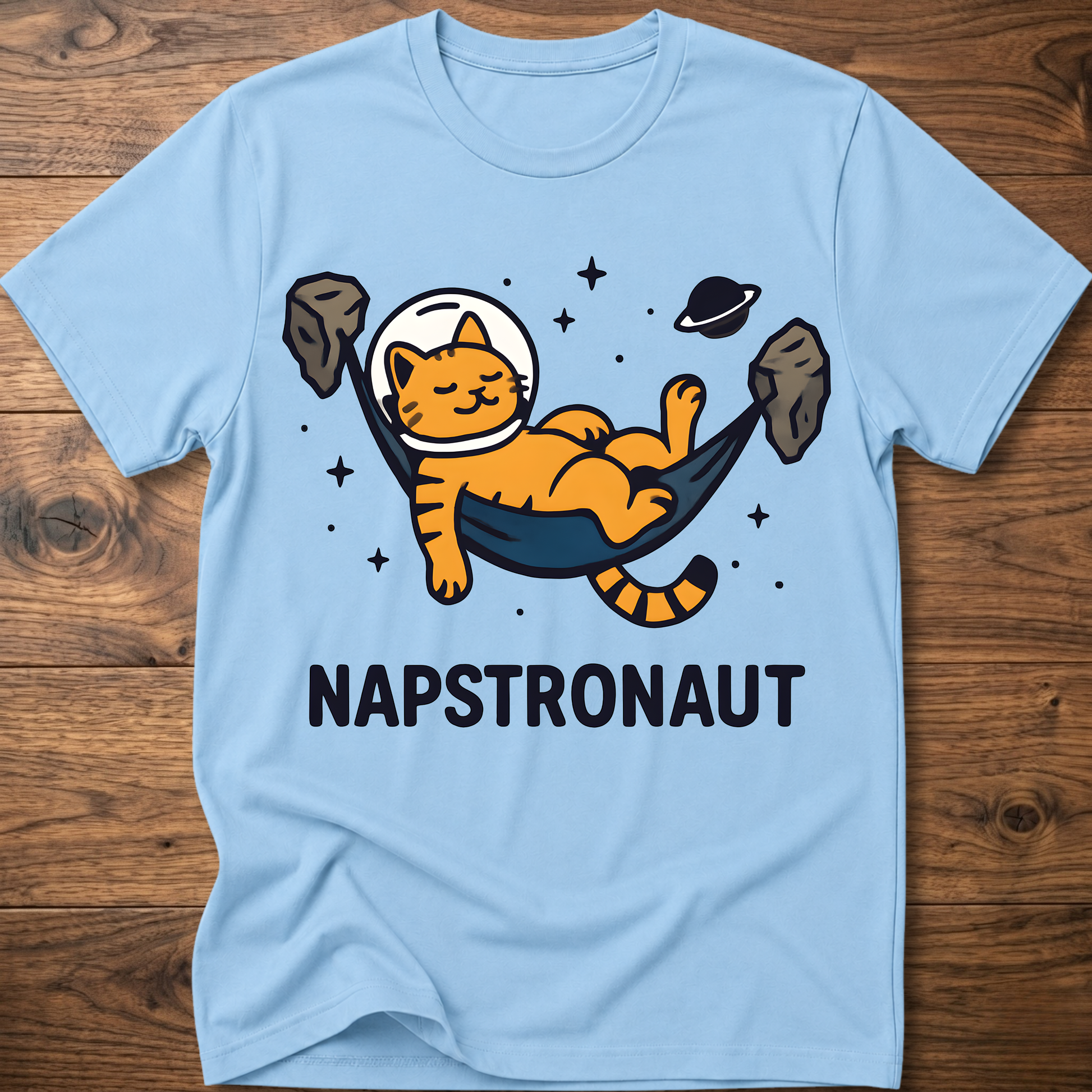 Light blue crew-neck cat astronaut graphic t-shirt with NAPSTRONAUT print