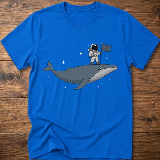 Royal blue t-shirt with astronaut riding a whale and holding a small flag graphic