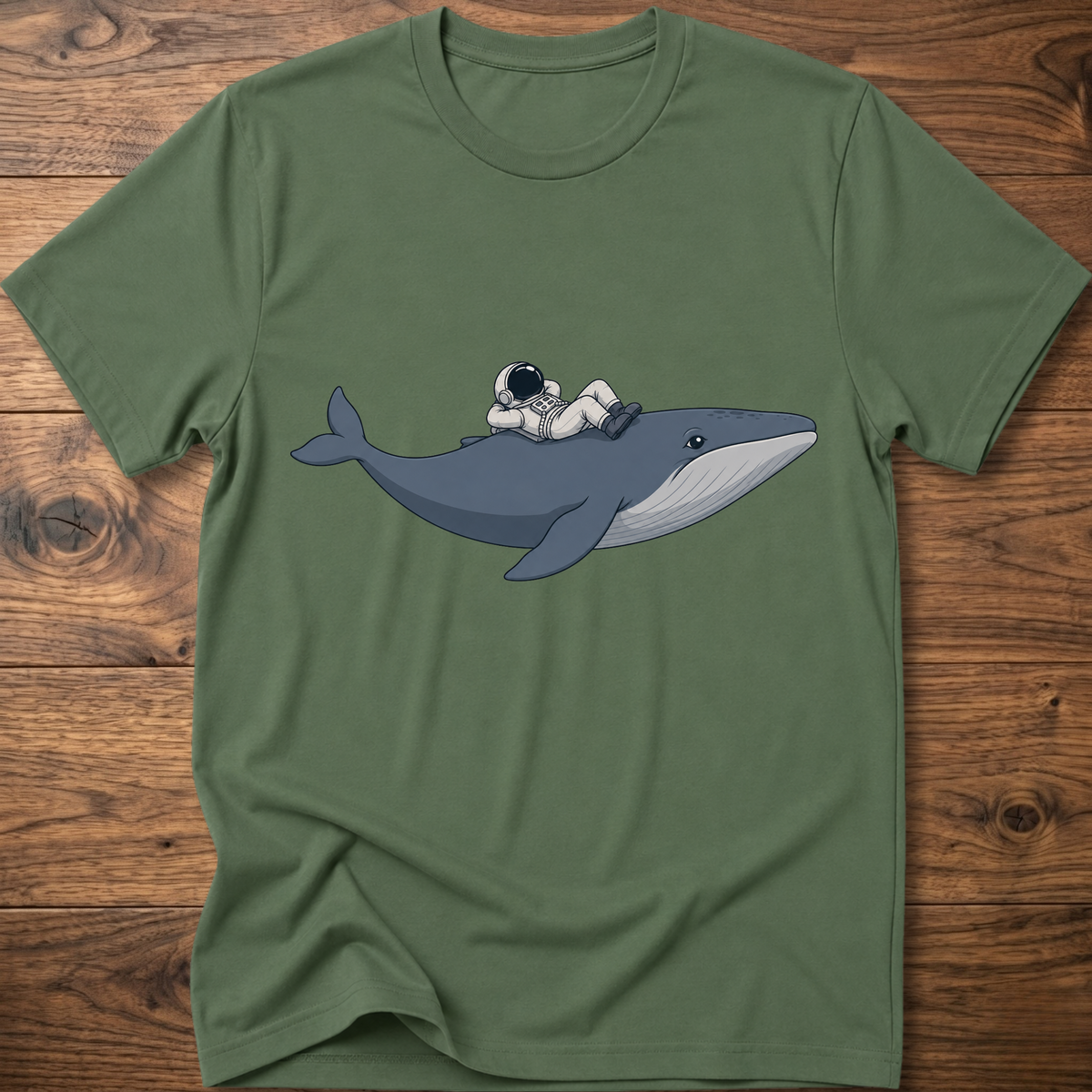 Military green Whale Astro Ride graphic t-shirt with whale and astronaut illustration