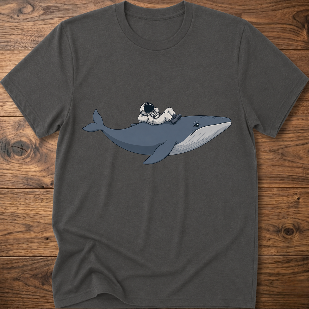 Charcoal Whale Astro Ride graphic t-shirt featuring a whale and astronaut floating