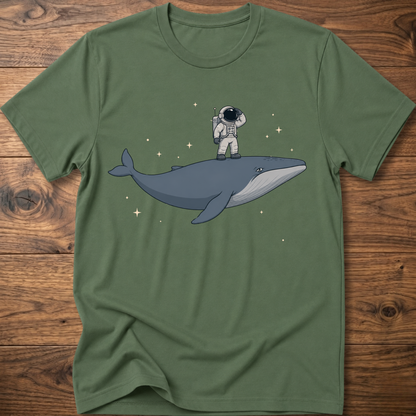 Military green short-sleeve t-shirt with astronaut riding a whale graphic and star accents