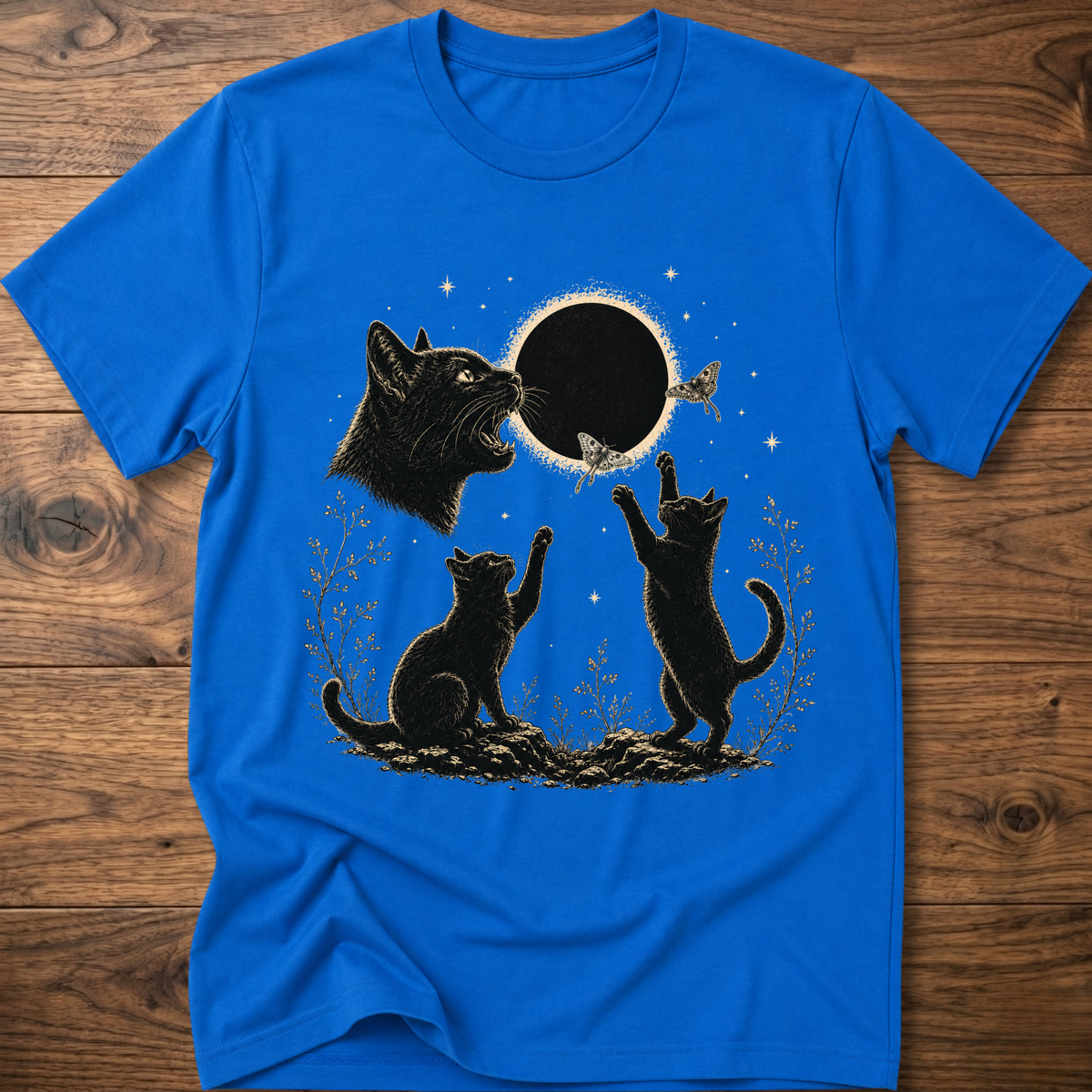 Royal blue crew-neck T-shirt with dark cat illustration and round eclipse graphic on front