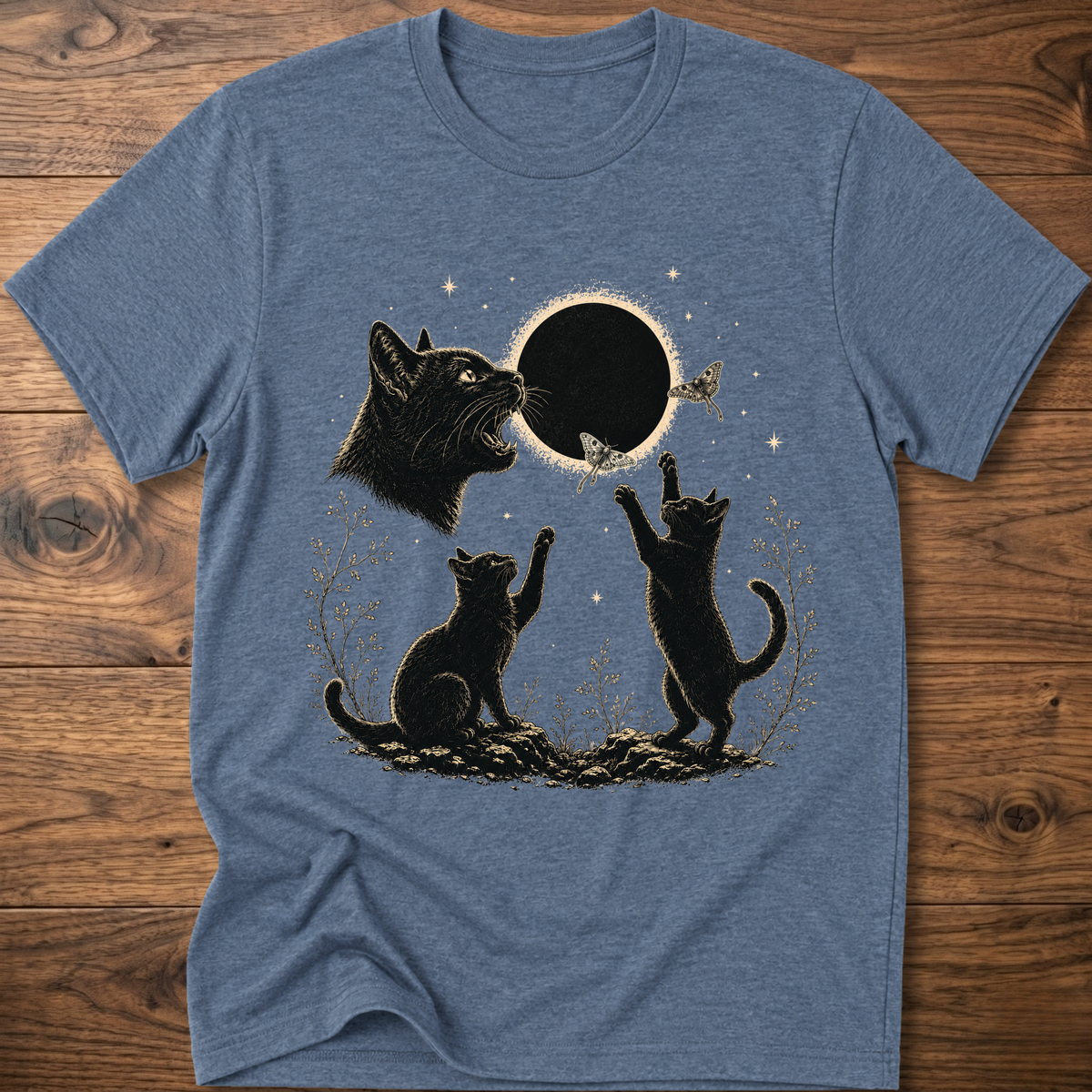 Heather indigo crew-neck T-shirt with dark cat illustration and round eclipse graphic on front
