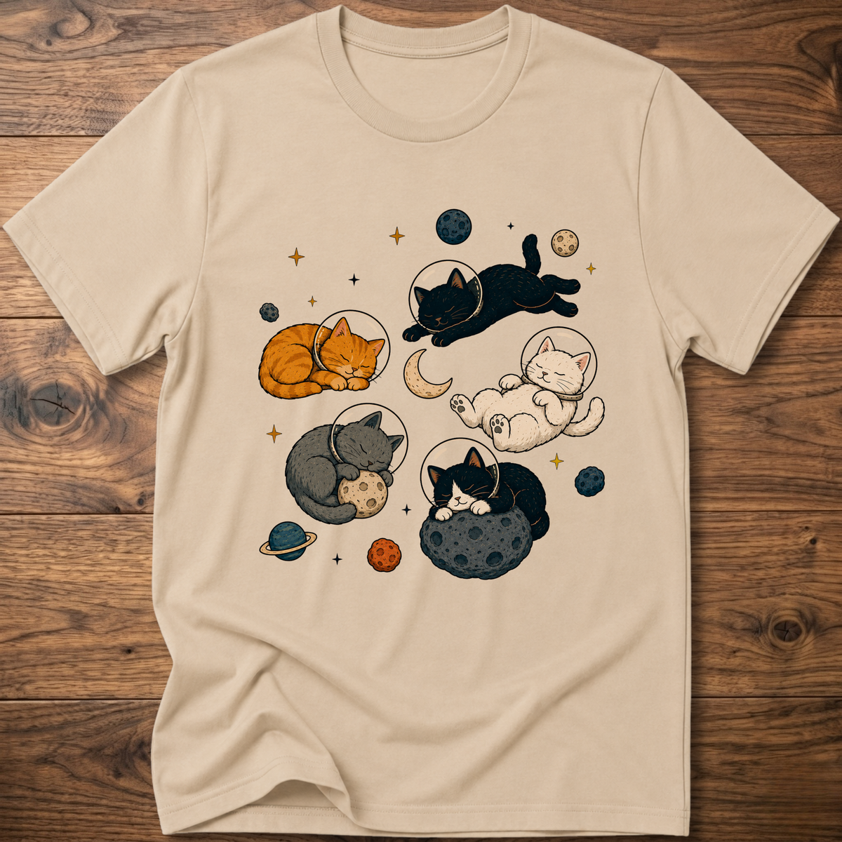 Cream cat nap T-shirt with sleeping cats and planets graphic
