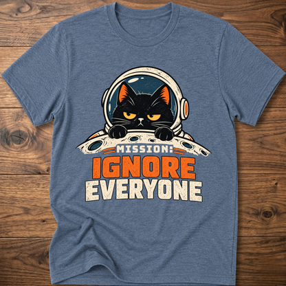 Heather blue T-shirt with cat astronaut 'Mission Ignore Everyone' graphic.