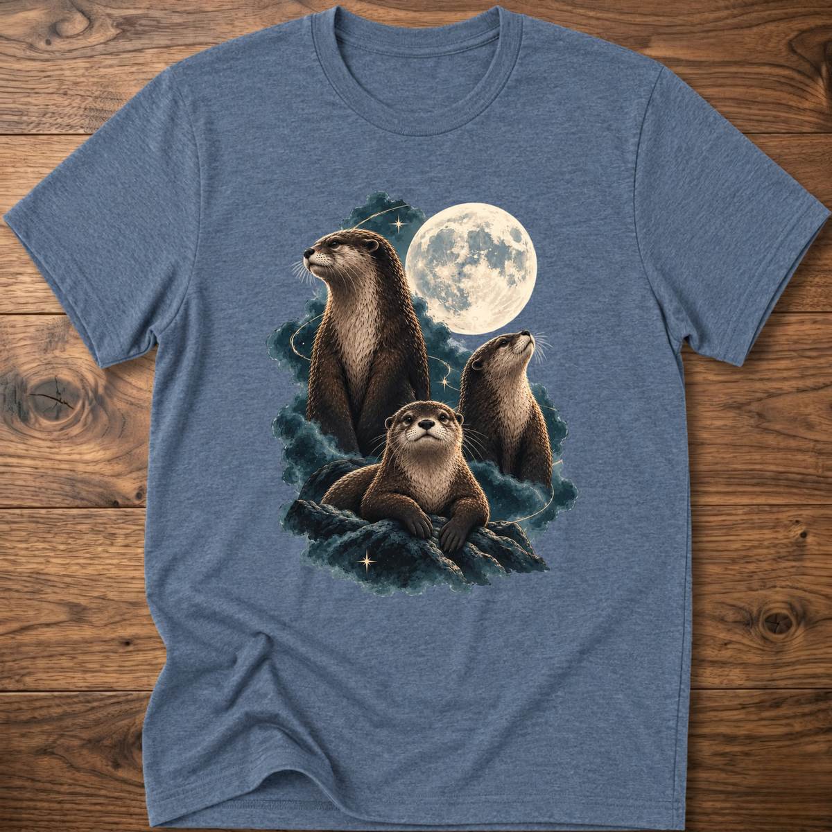 Heather indigo t-shirt with moonlit otter graphic and teal waves on the chest