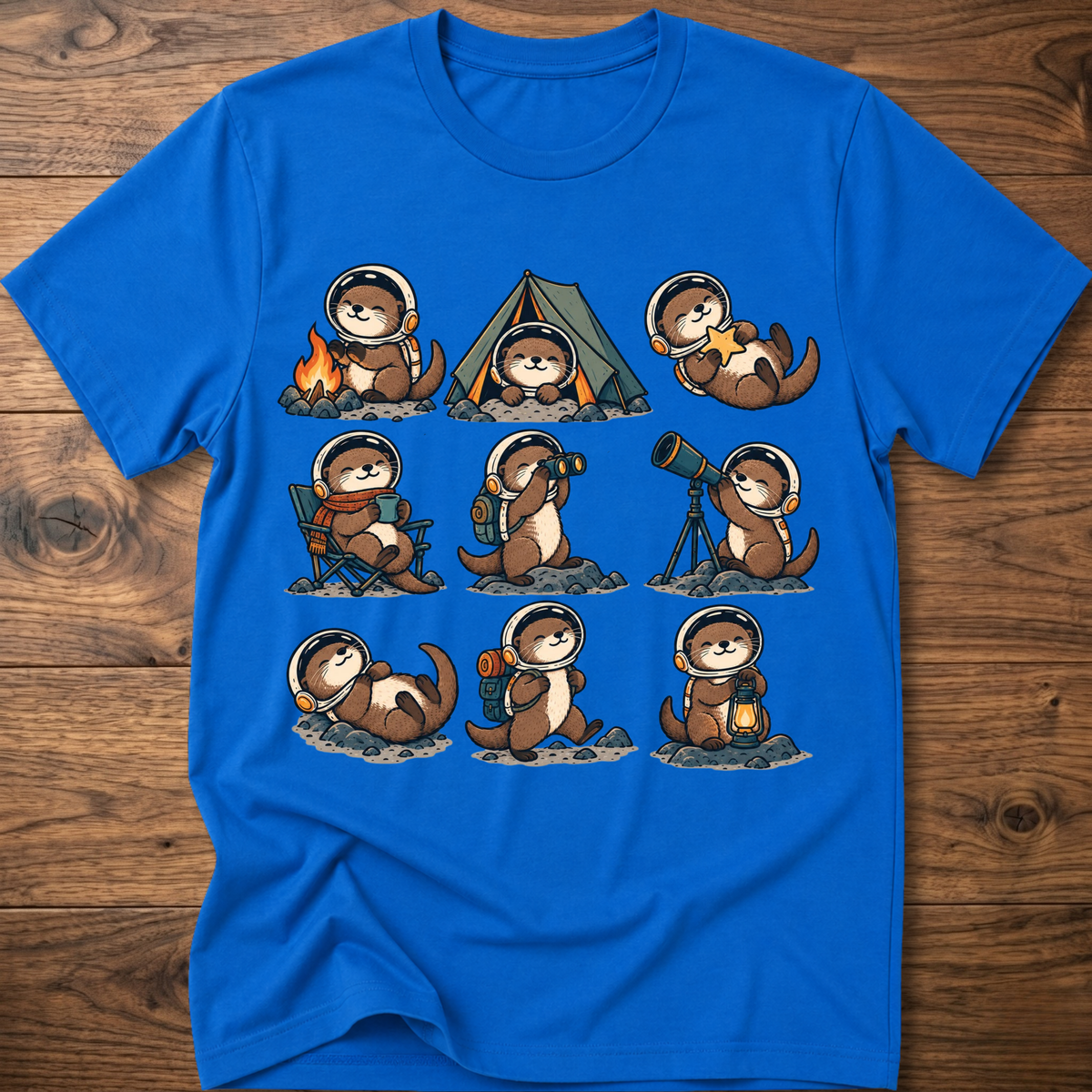 Royal blue T-shirt with space otter crew graphic across front